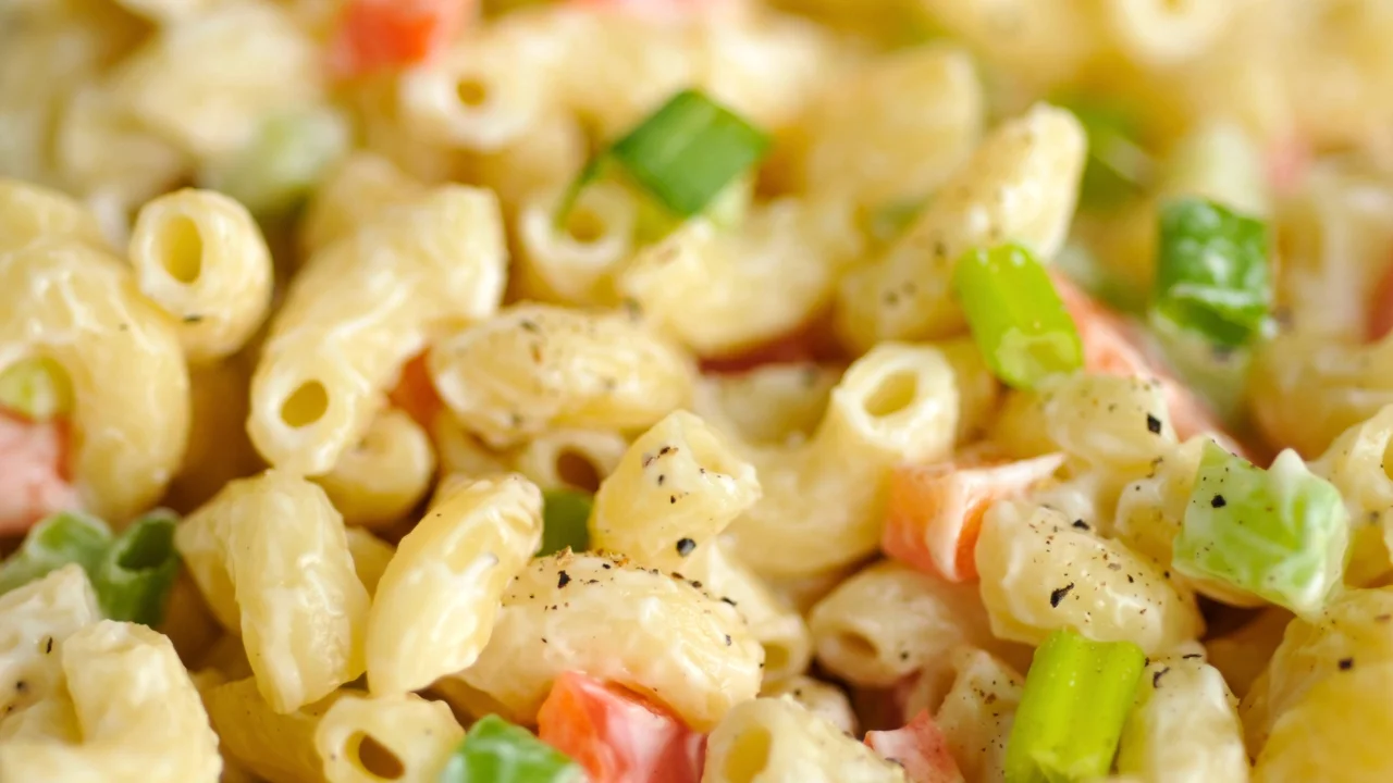 Creamy macaroni salad with vegetables