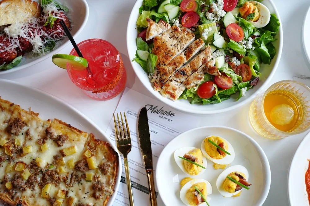 Grilled chicken salad with fresh greens and vegetables