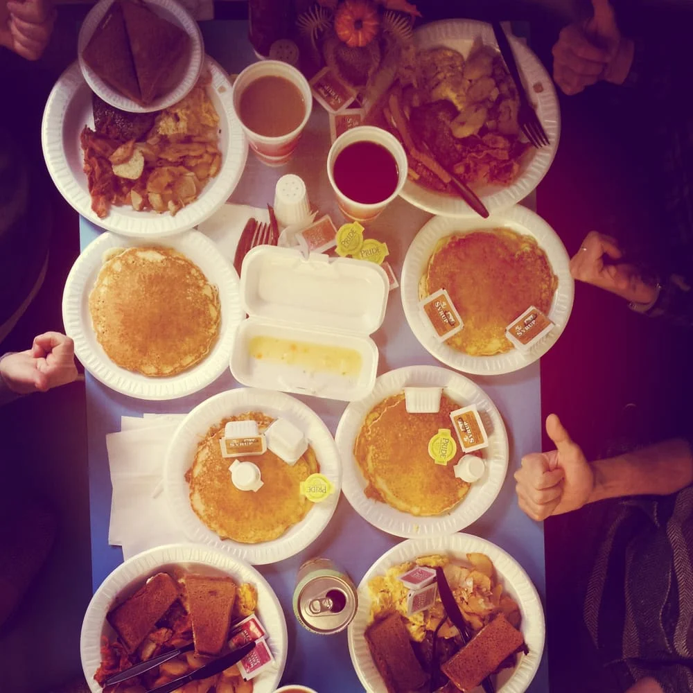 Delicious American breakfast with pancakes and sides