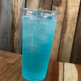 Refreshing blue cocktail served over ice