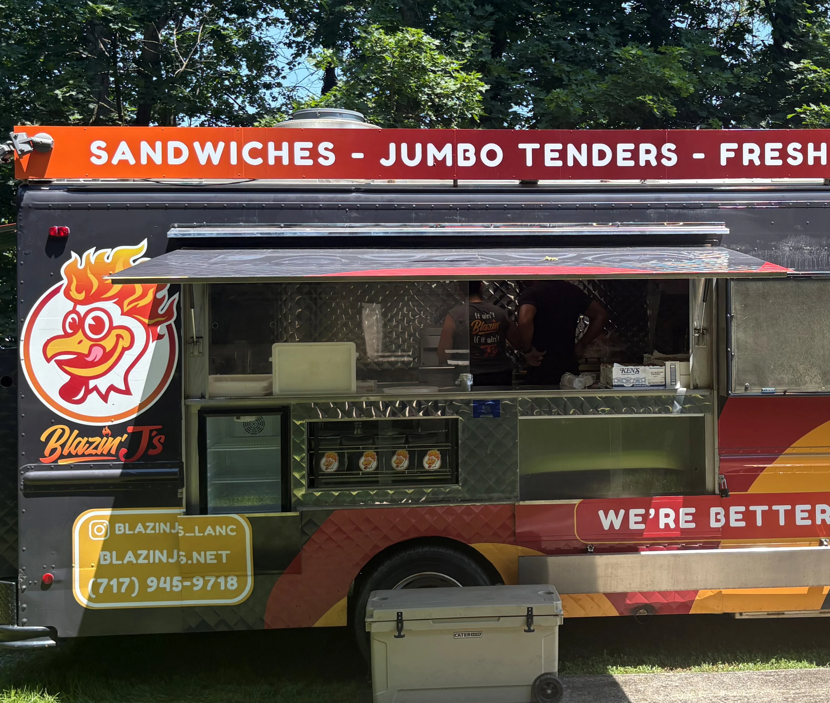 Food truck serving sandwiches and jumbo tenders