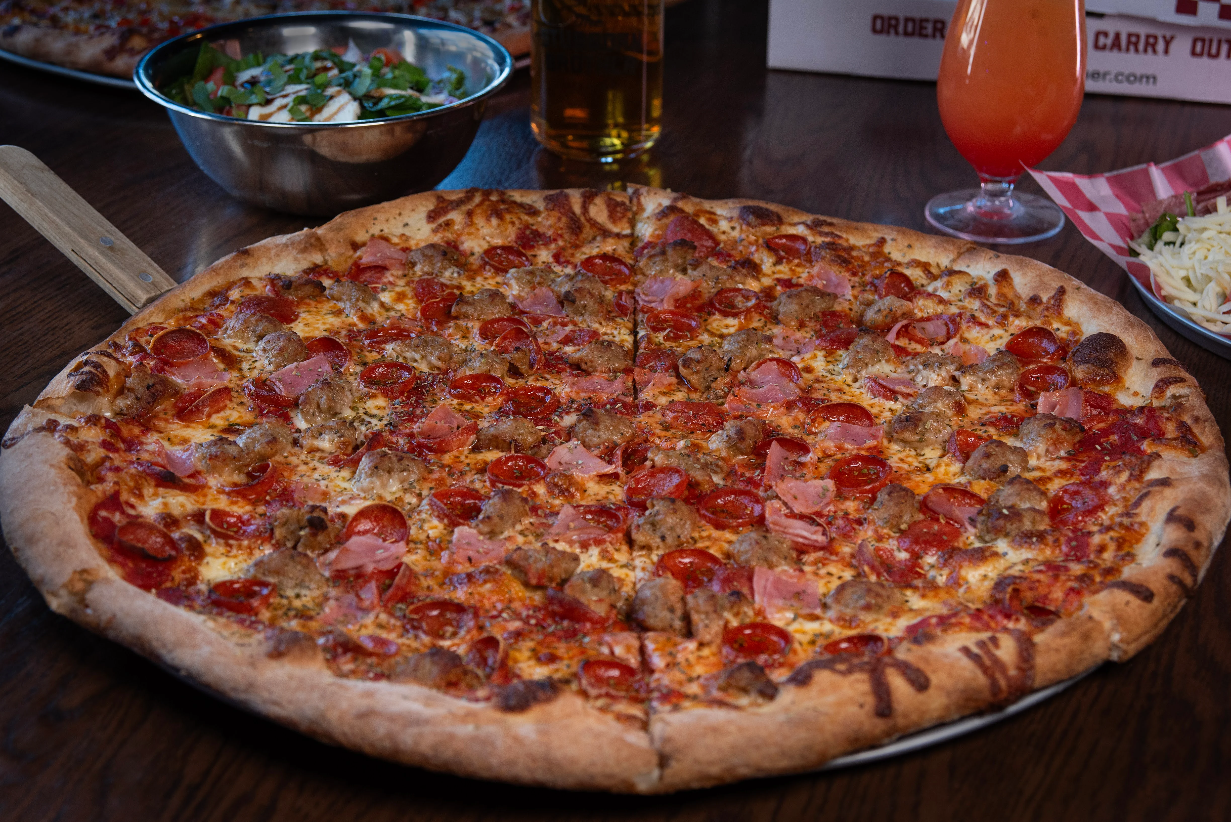 Loaded meat lover's pizza with pepperoni and sausage