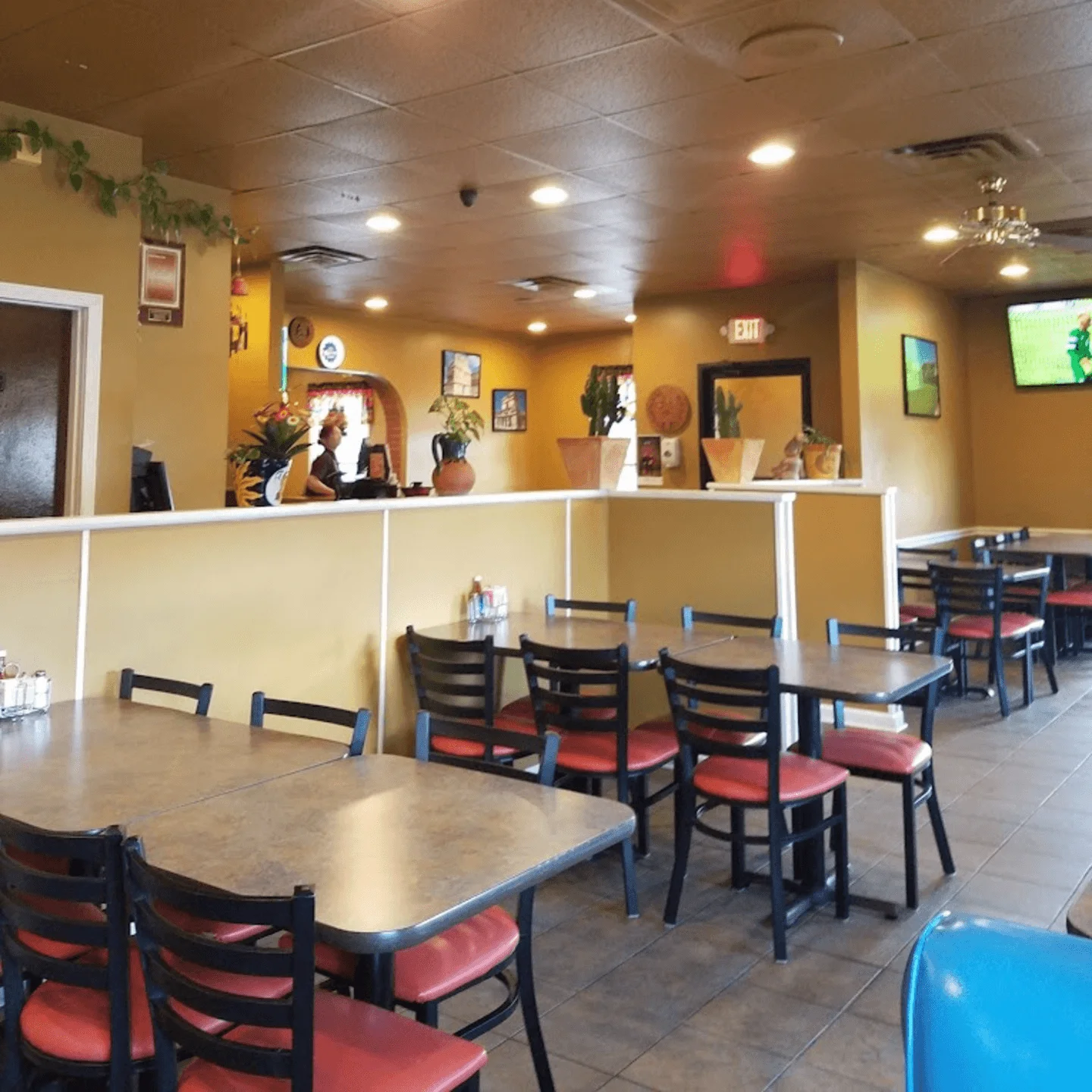Cozy restaurant interior with warm colors and seating