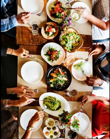 Diverse Mediterranean feast with salads and pasta