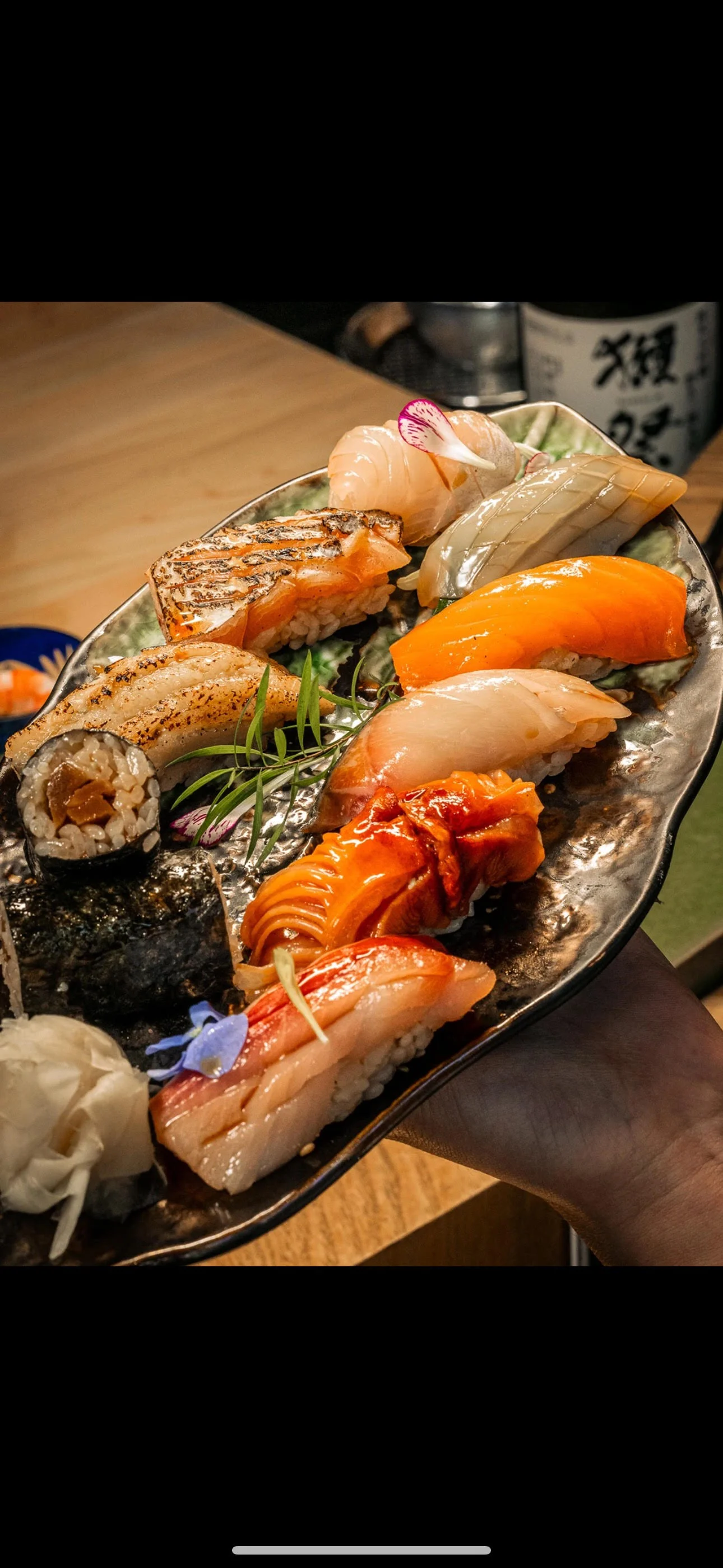 Assorted sushi platter featuring nigiri and maki