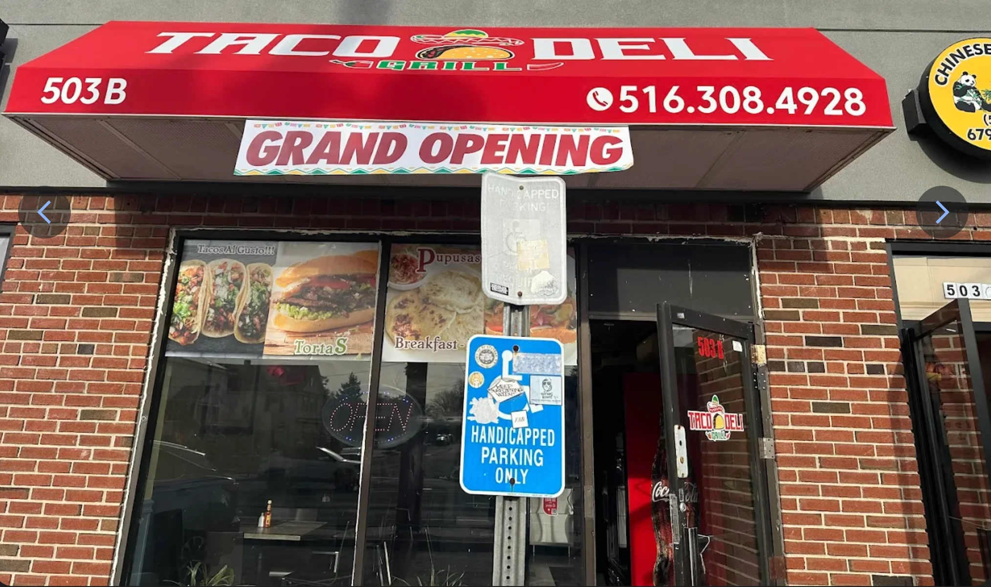 Taco Deli restaurant exterior with grand opening sign
