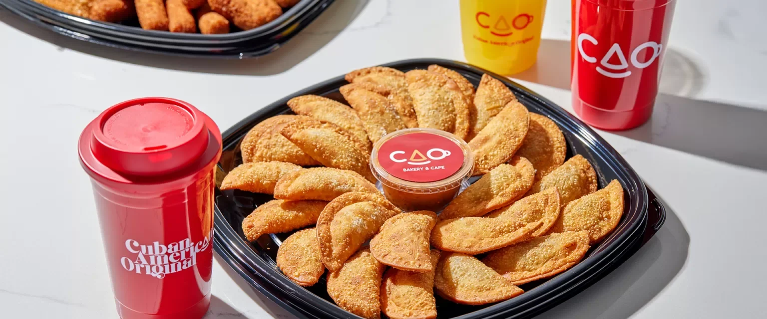 Cuban empanadas served with dipping sauce