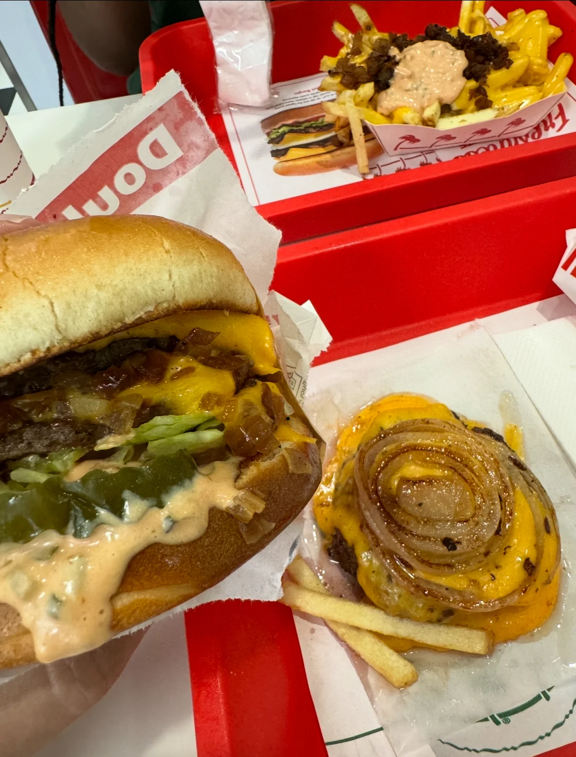 Juicy cheeseburger with special sauce and loaded fries