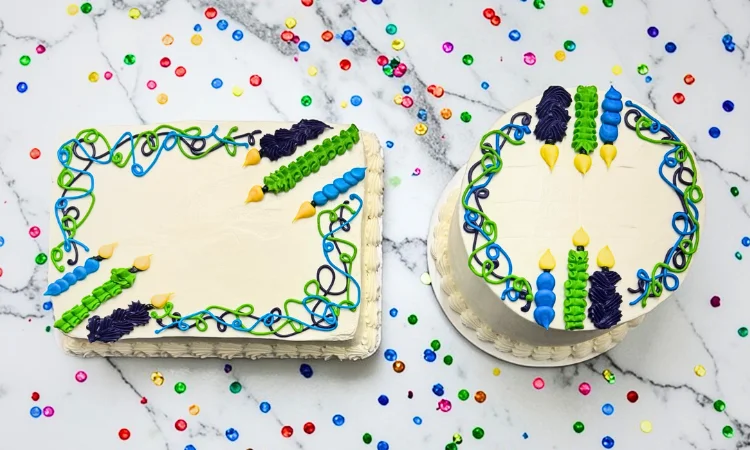 Colorful birthday cakes with festive decorations