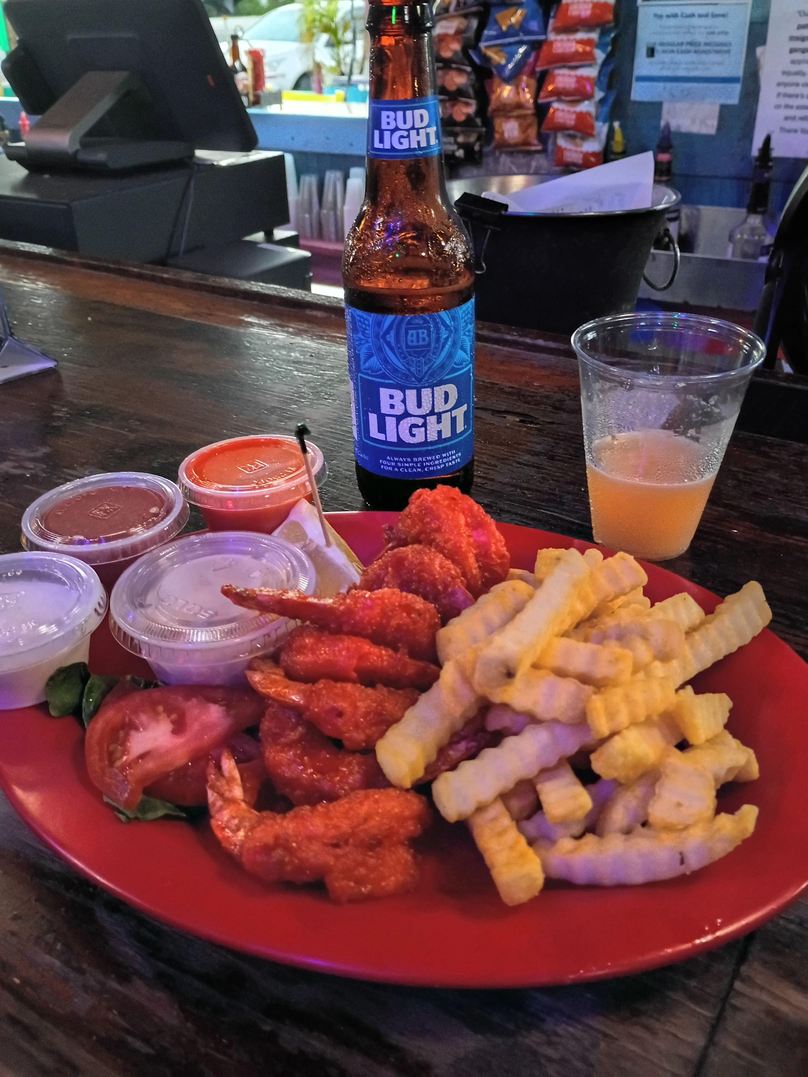 Crispy buffalo shrimp with fries and dipping sauces