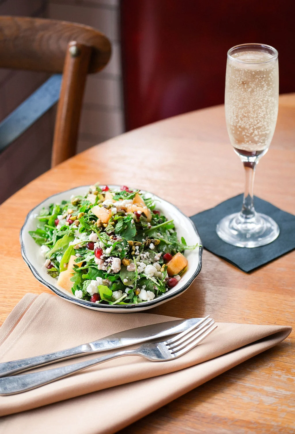 Fresh garden salad with pomegranate and feta cheese