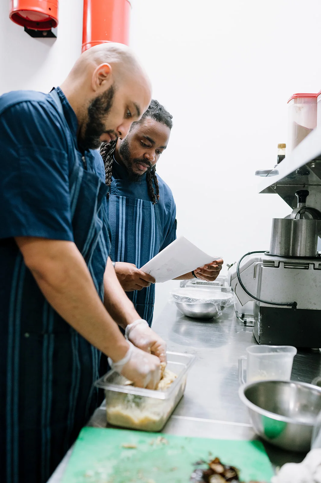 The Tripoli’s kitchen team preparing dishes in Alamo Ranch, San Antonio