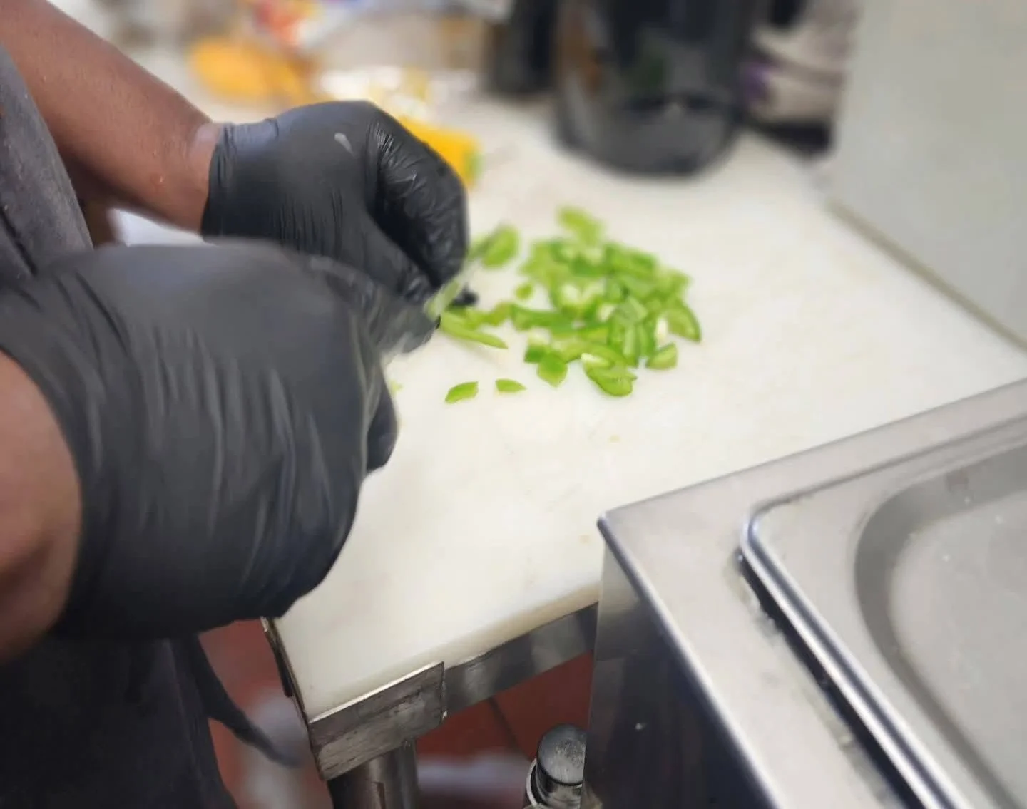 Chef preparing fresh vegetables in a professional kitchen