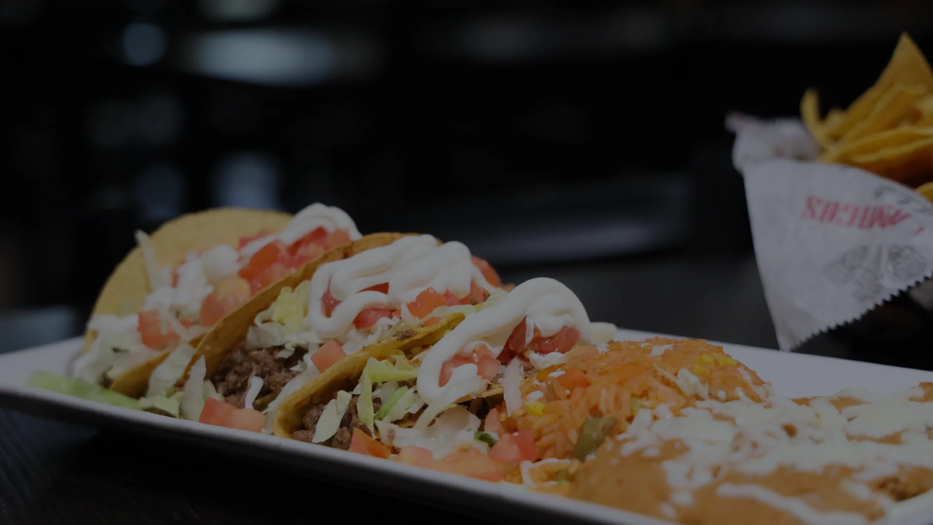 Delicious Mexican tacos with toppings and sides