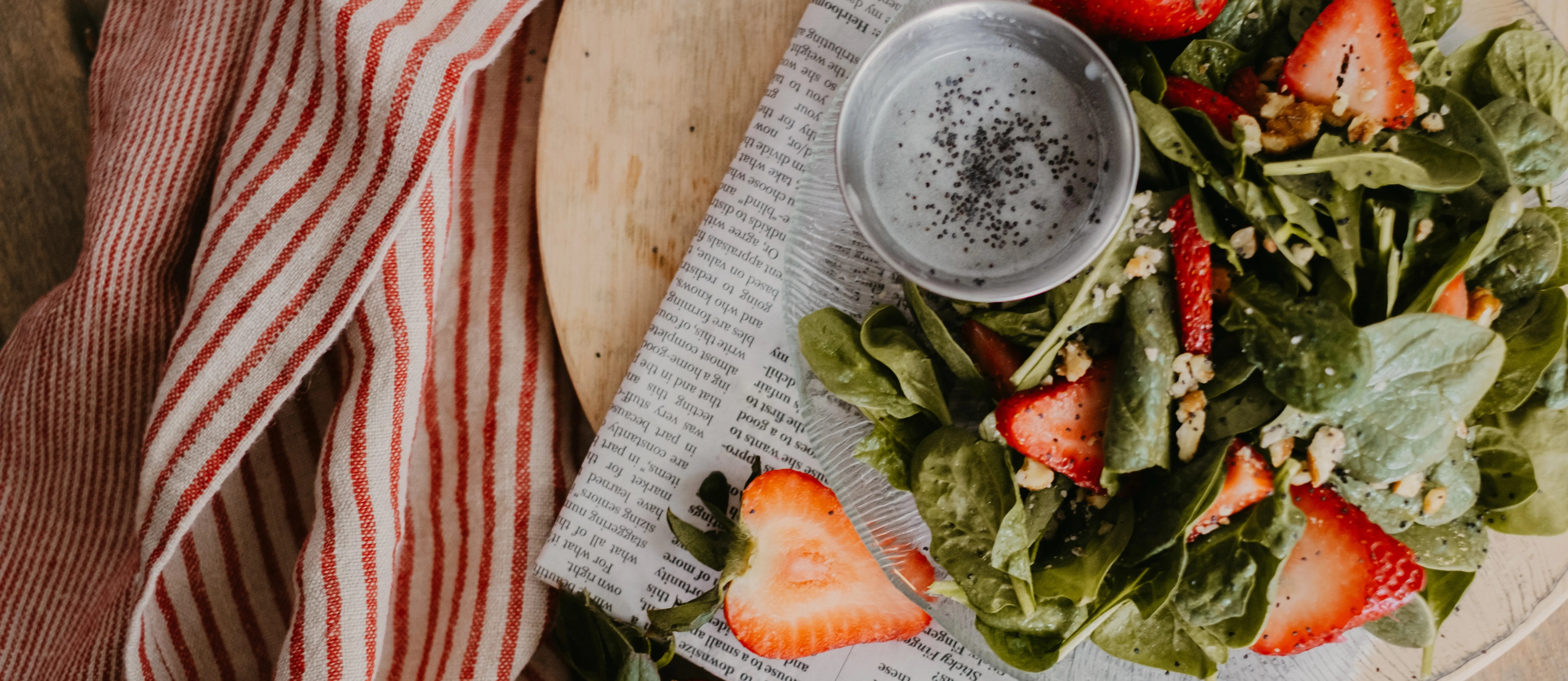 Fresh spinach salad with strawberries and poppy seed dressing