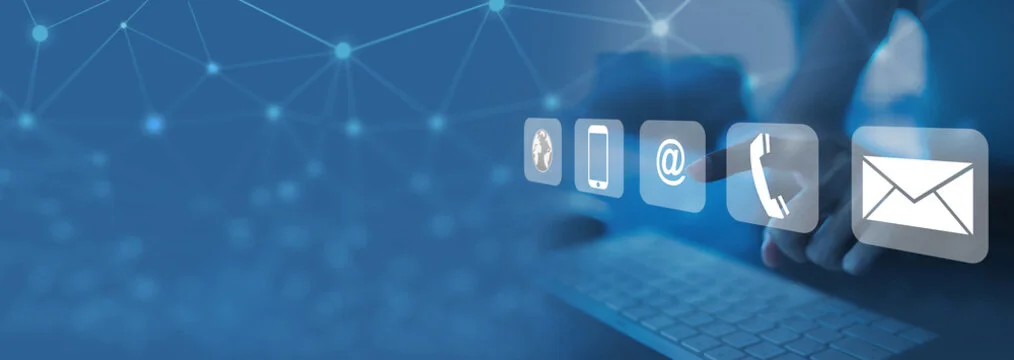 Digital communication icons on a blue background with a keyboard
