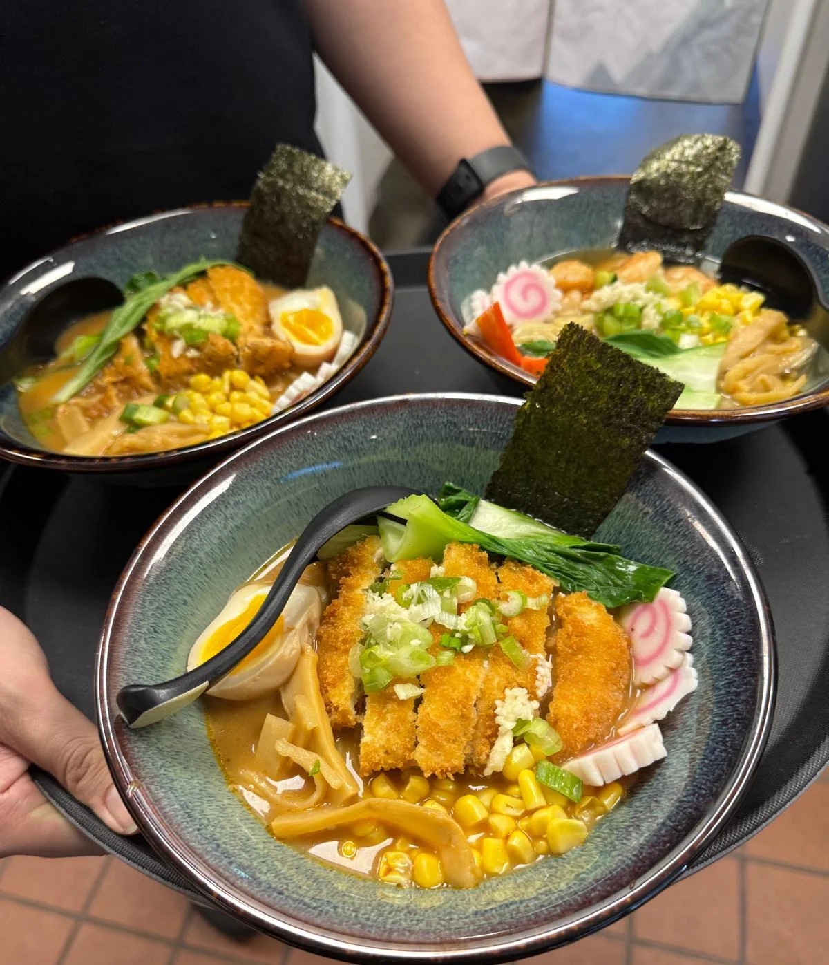 Japanese katsu ramen bowls with crispy cutlet and nori