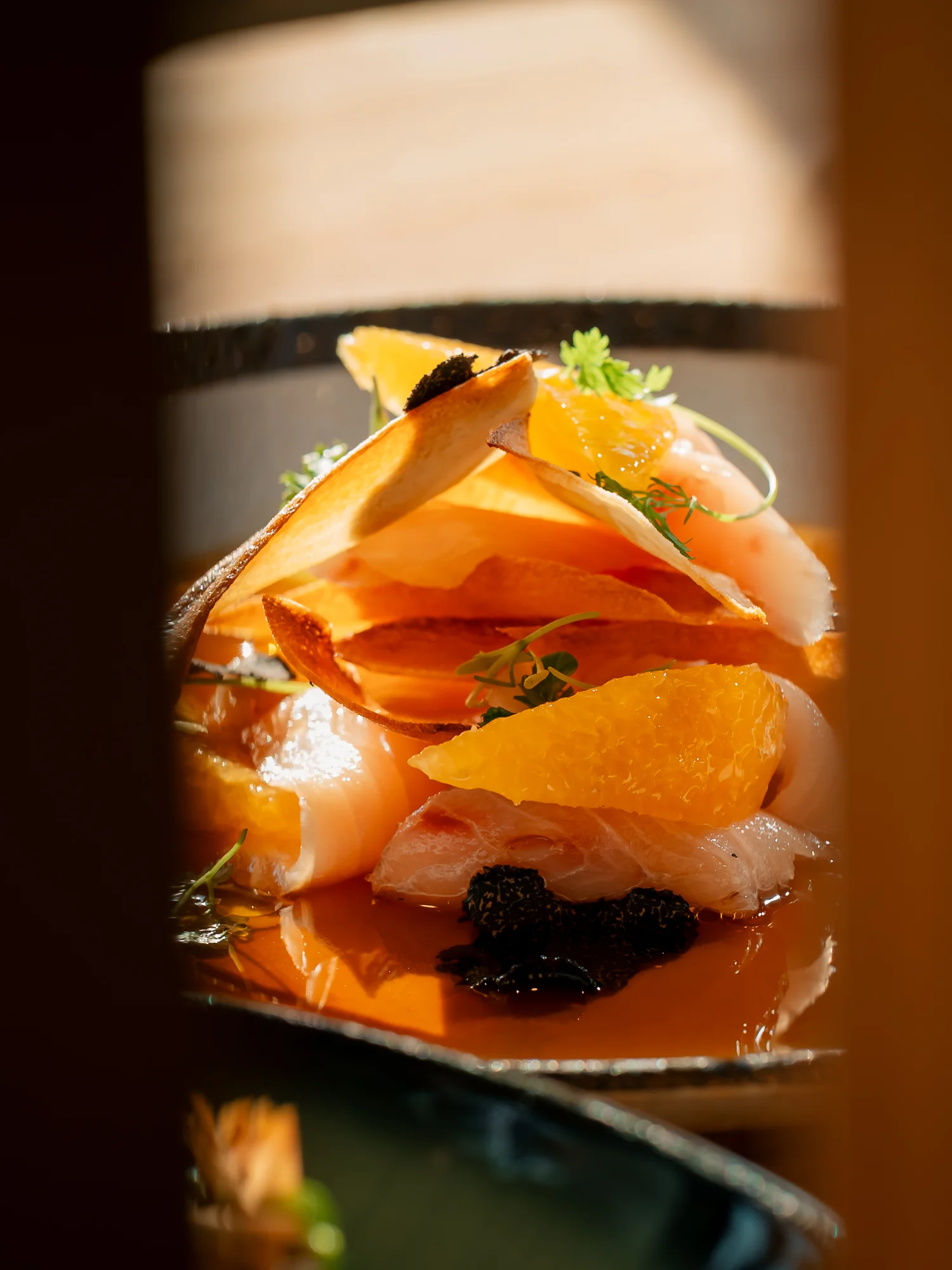 Japanese sashimi platter with citrus and garnishes
