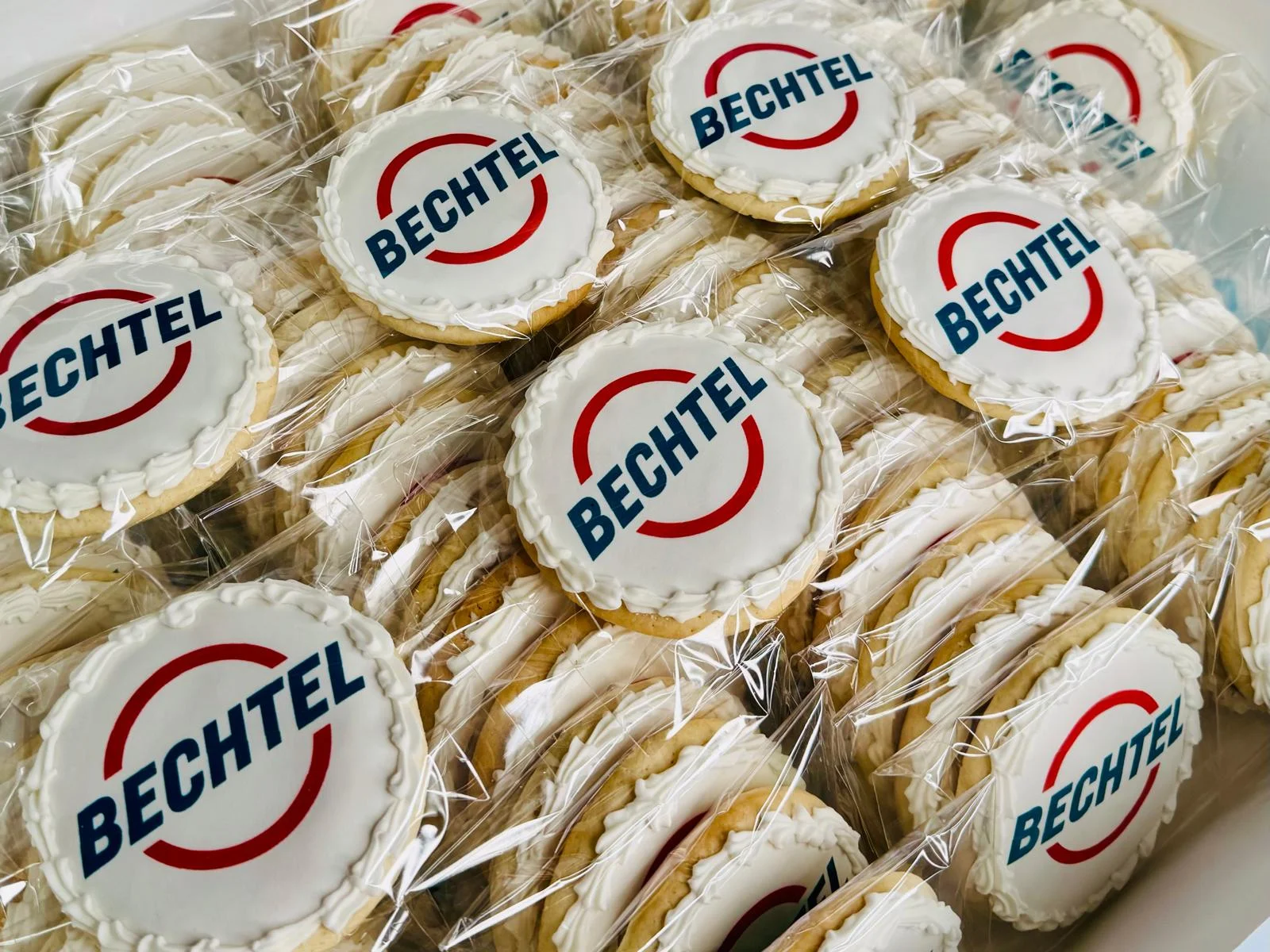 Decorative cookies with Bechtel logo in clear packaging