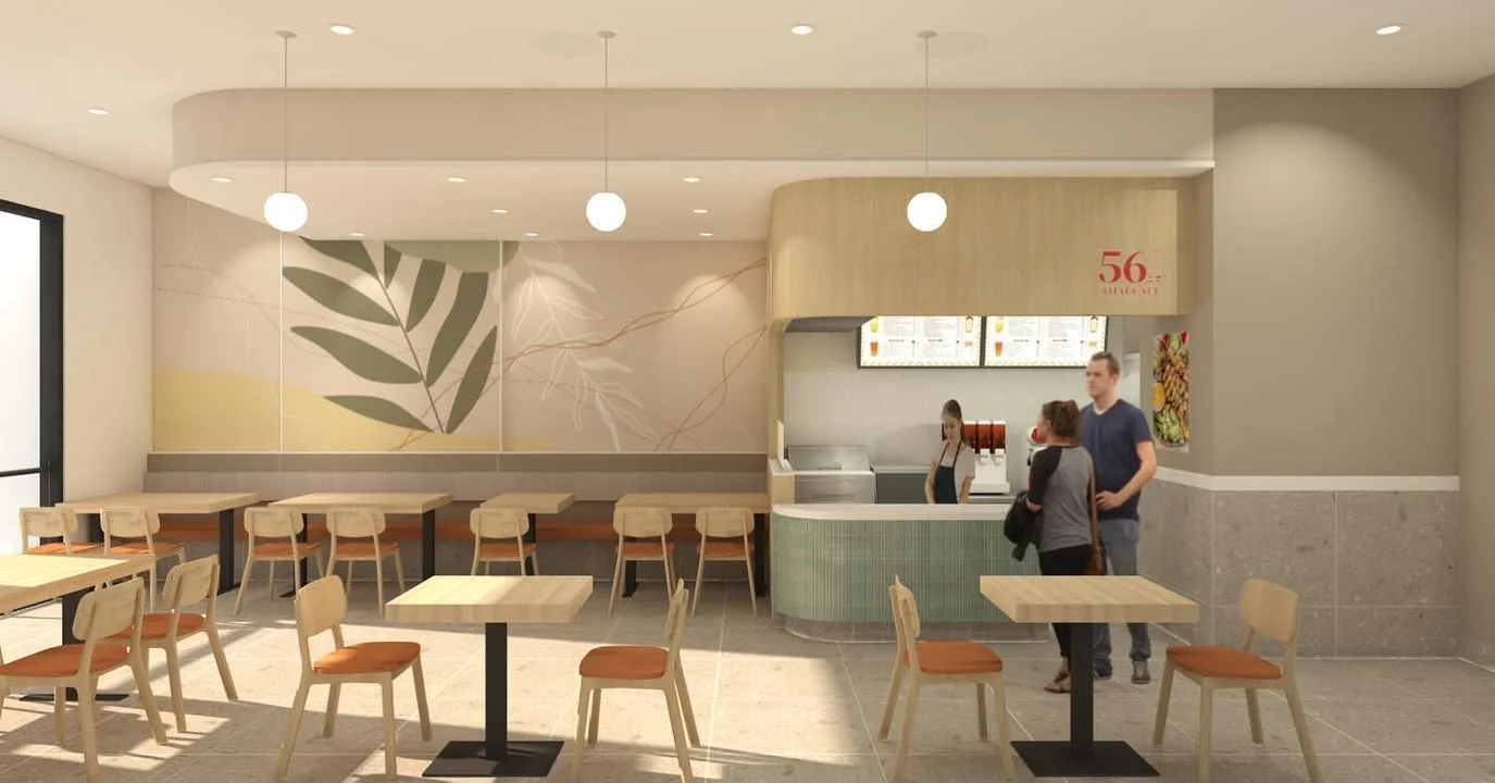 Modern restaurant interior with light wood accents and seating