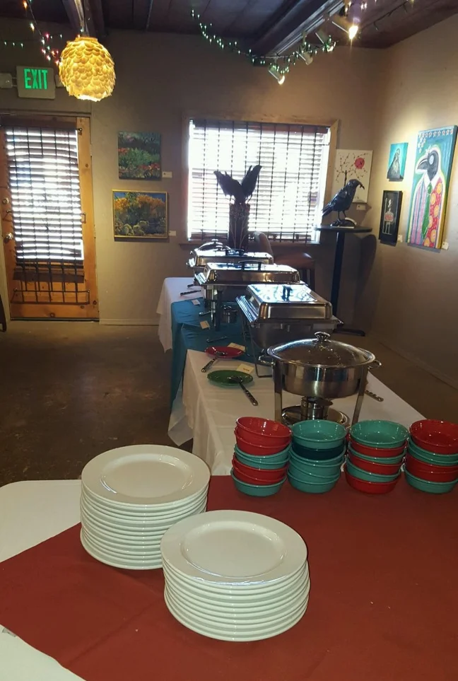Elegant dining setup with plates and colorful bowls