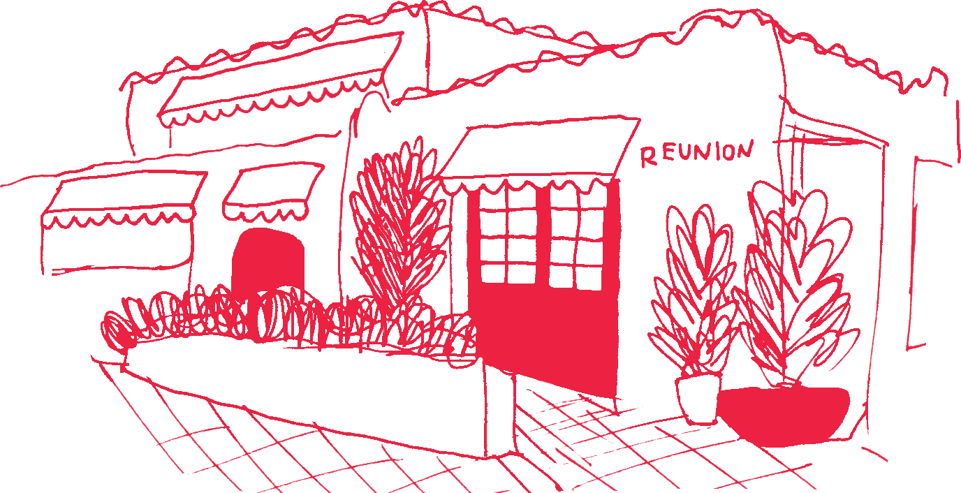 Charming restaurant exterior with plants and a welcoming entrance