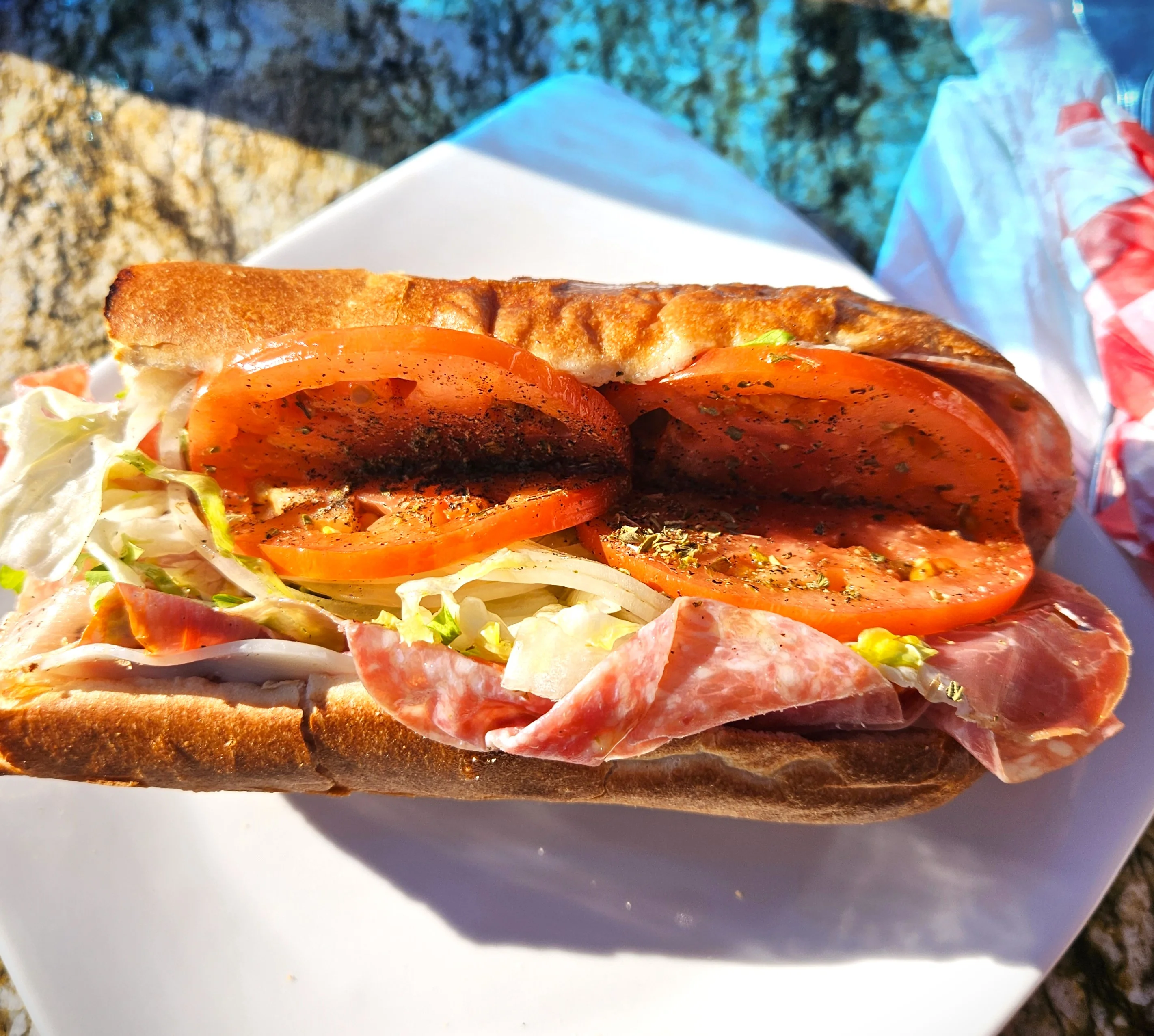 Italian sub sandwich with fresh vegetables