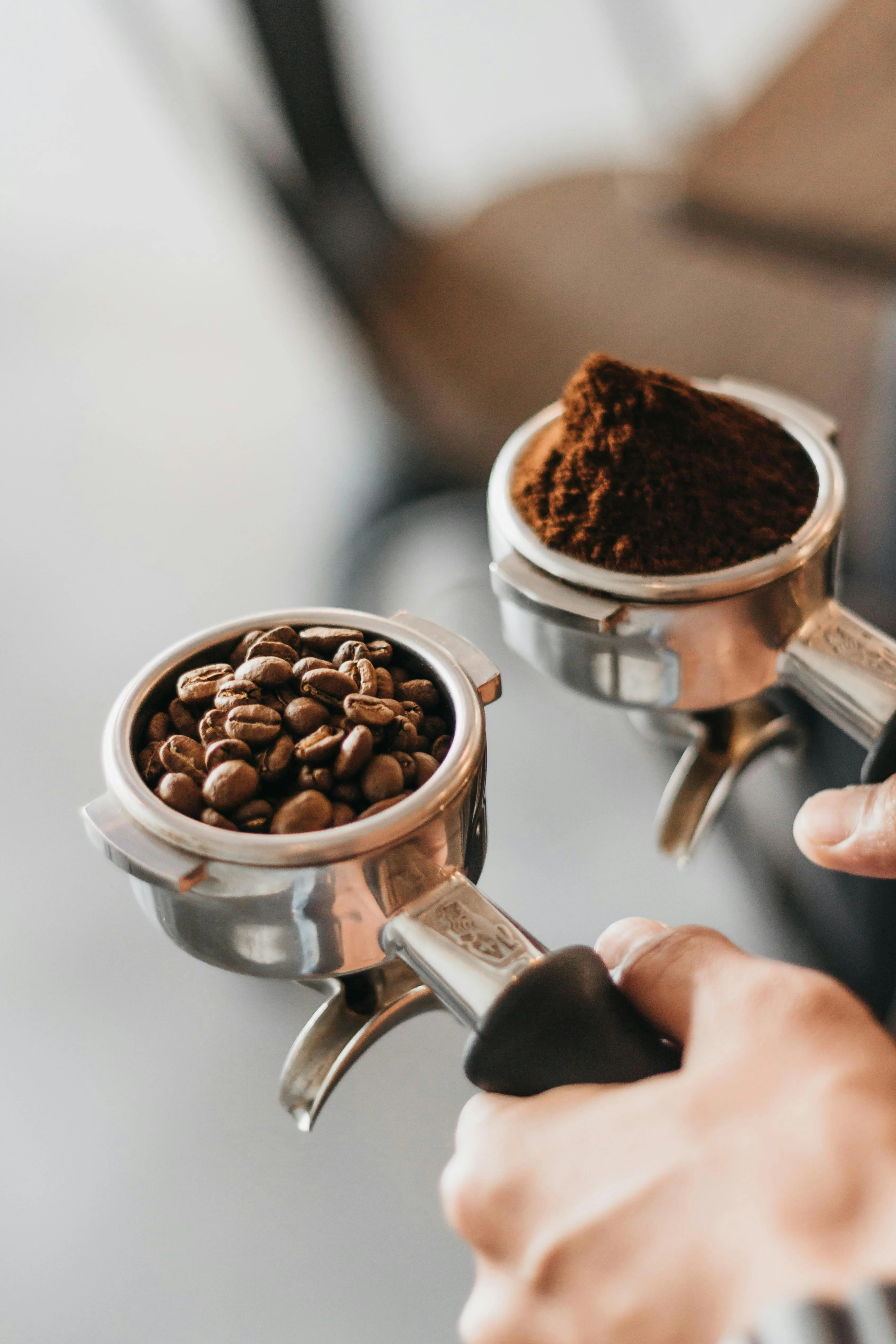 Coffee beans and ground coffee in a portafilter