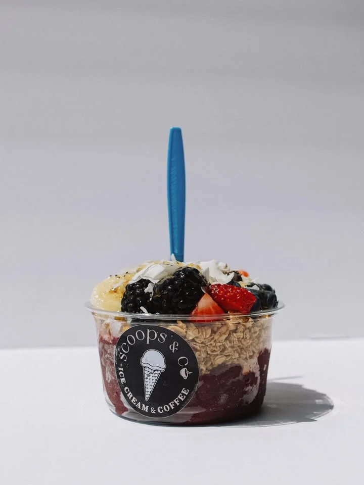 Acai bowl topped with fresh fruits and granola