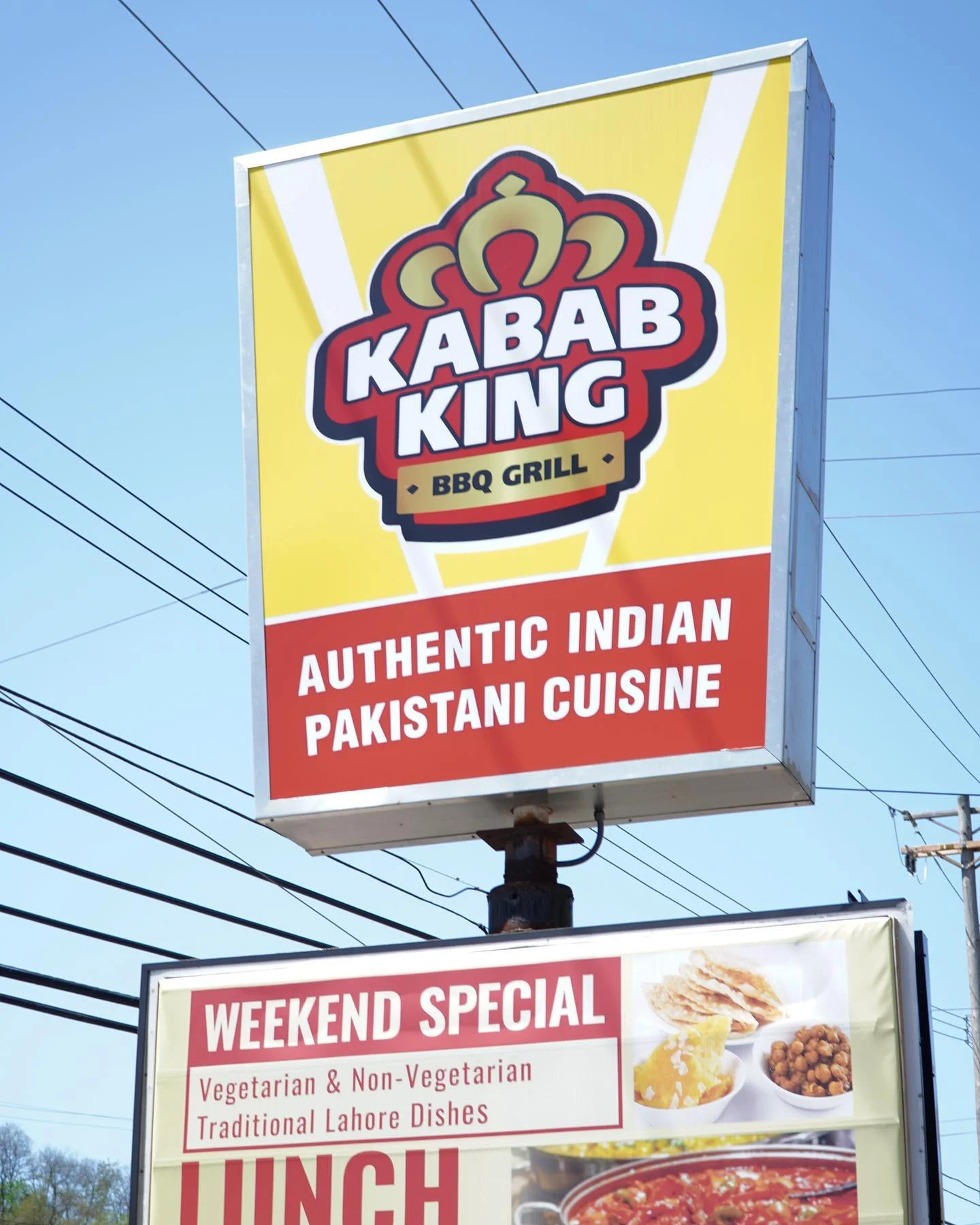 Delicious kababs served on a platter with fresh vegetables.
