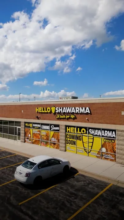 Exterior of Hello Shawarma restaurant with signage