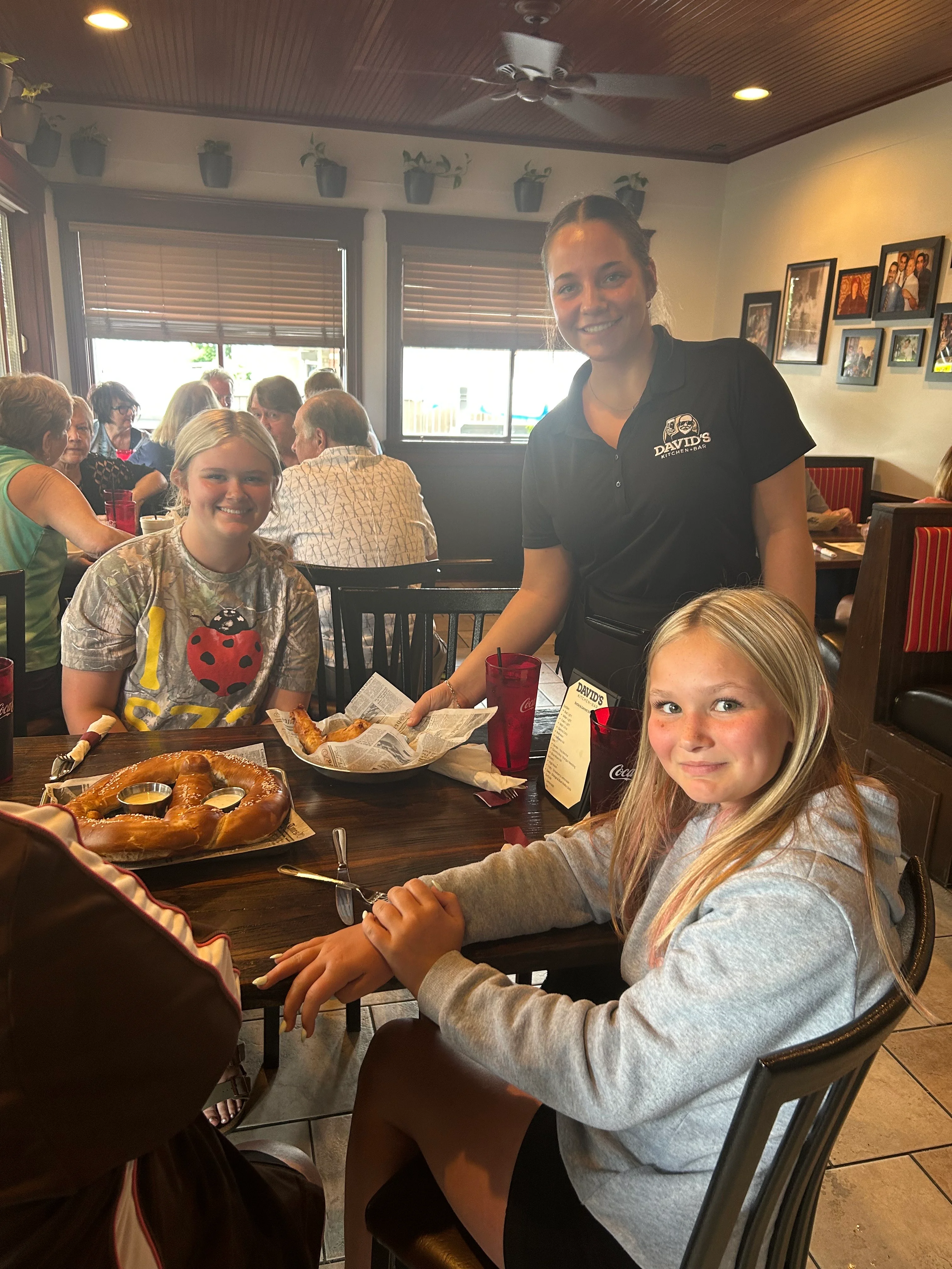 Cozy restaurant scene with diners enjoying pretzels