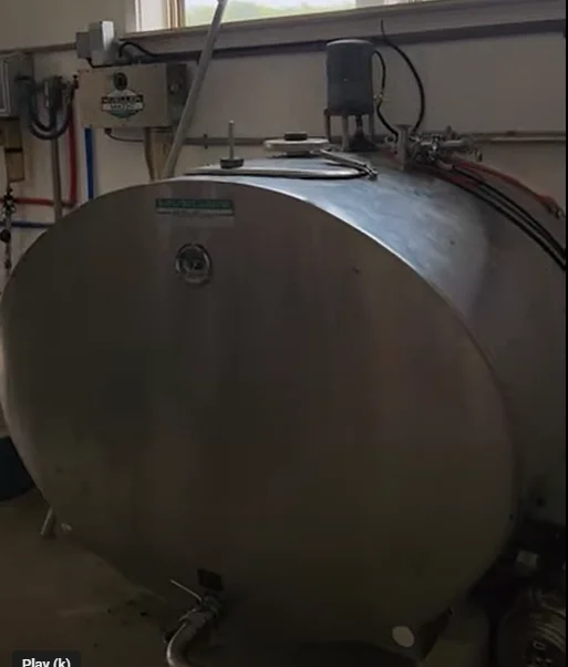 Industrial stainless steel tank in a commercial kitchen