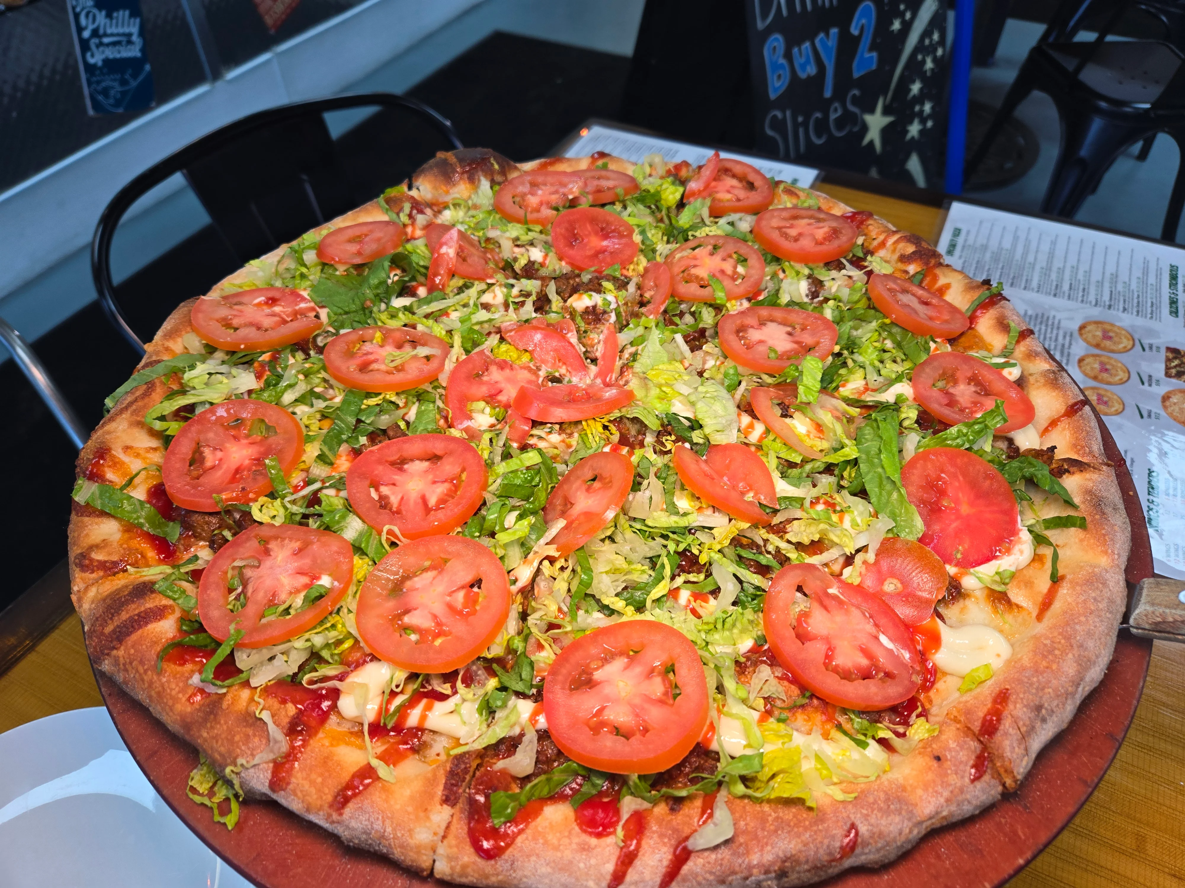 A beautifully decorated vegetarian pizza from Lucino's Pizza