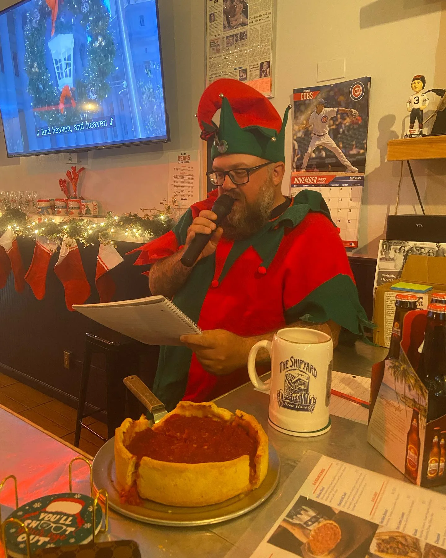 Chicago deep-dish pizza served in a festive restaurant setting