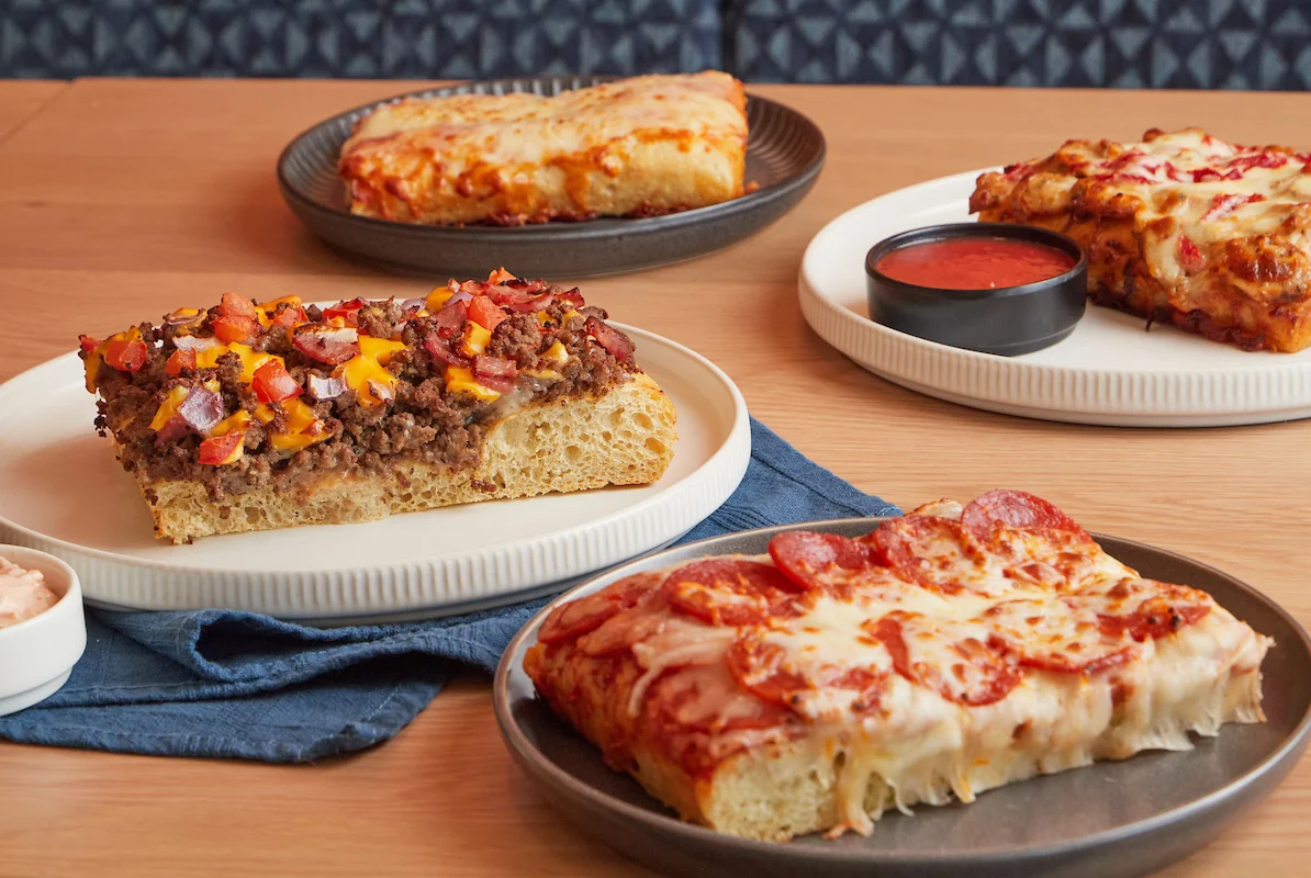 Group shot of a variety of pizza slices