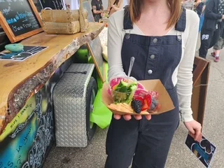 Colorful fruit cup from a food festival