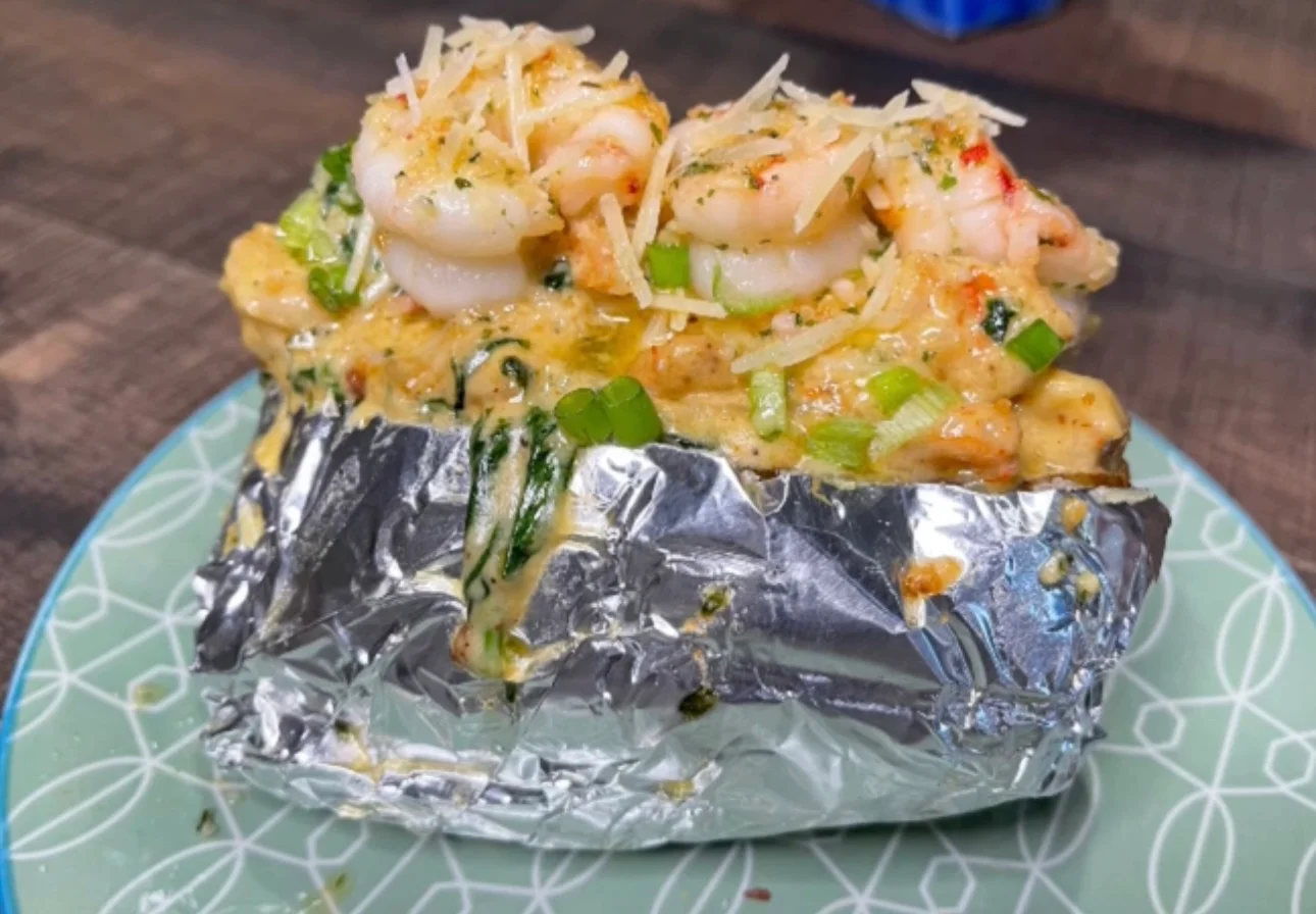 Shrimp stuffed baked potato with cheese
