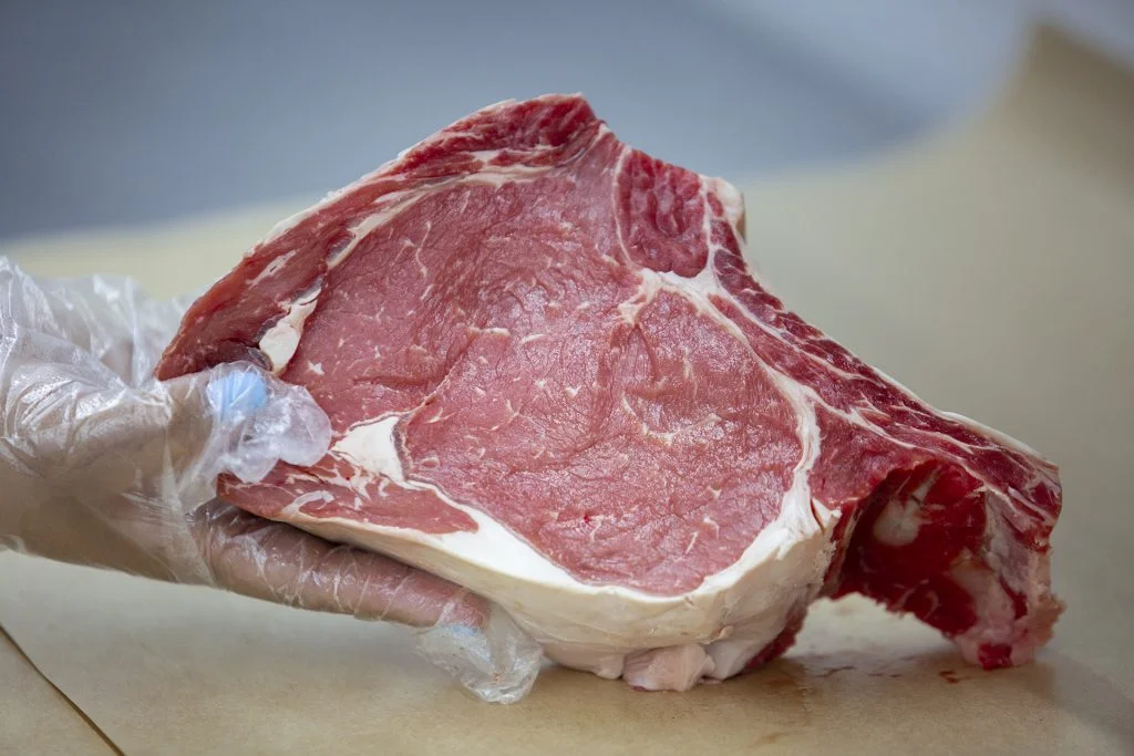 Fresh ribeye steak ready for grilling