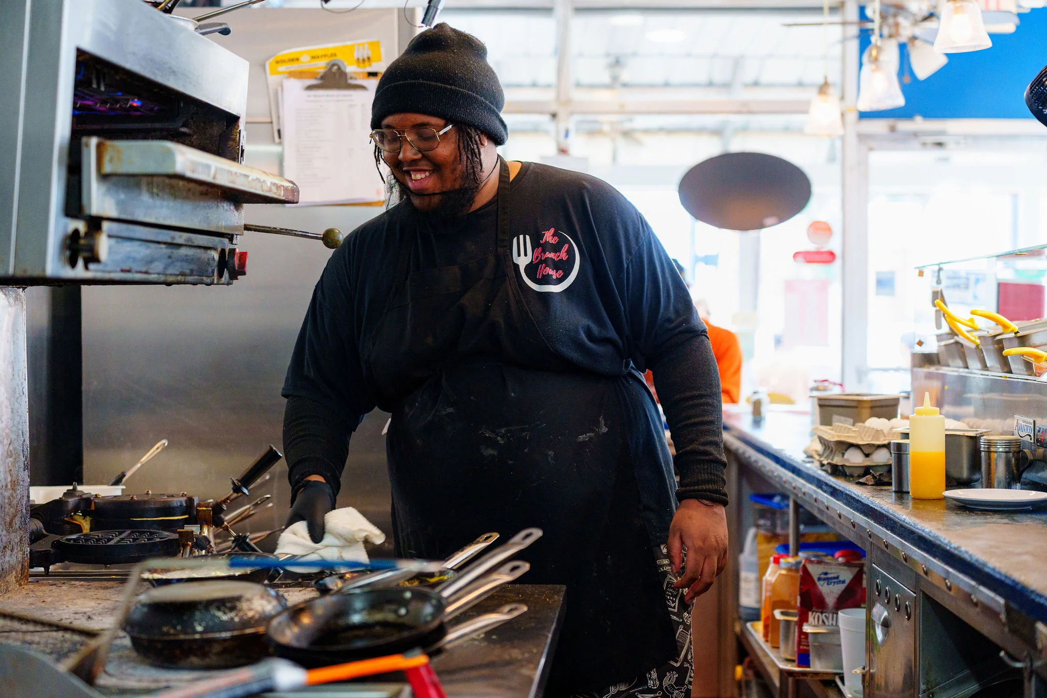 Chefs preparing made-to-order brunch dishes at The Brunch House Augusta