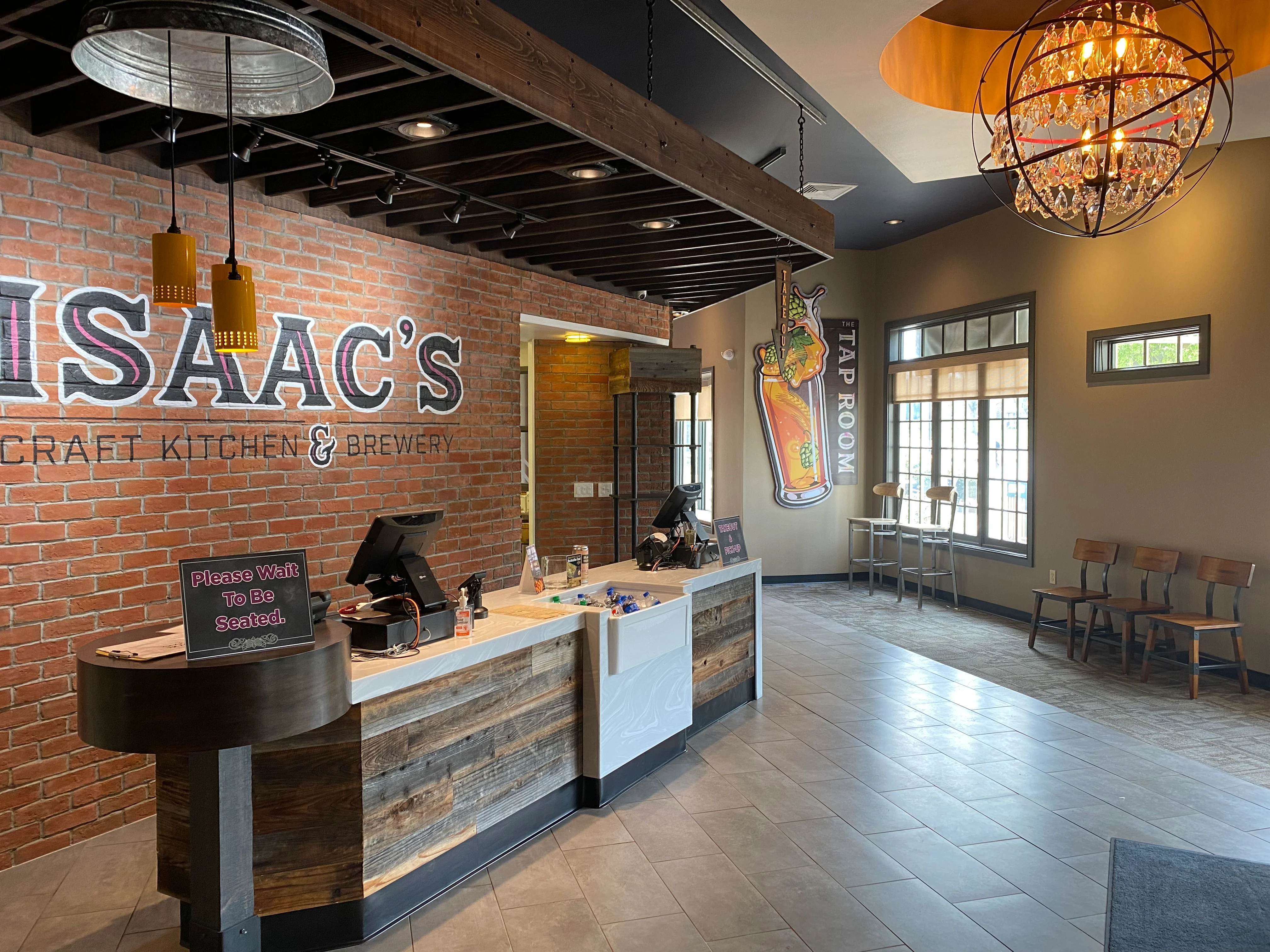 Fresh ingredients and homemade soups at Isaac's Craft Kitchen & Brewery, featuring shrimp, vibrant bell peppers, spinach, carrots, tomatoes, and artisanal ingredients. A farm-to-table selection highlighting produce and seafood.