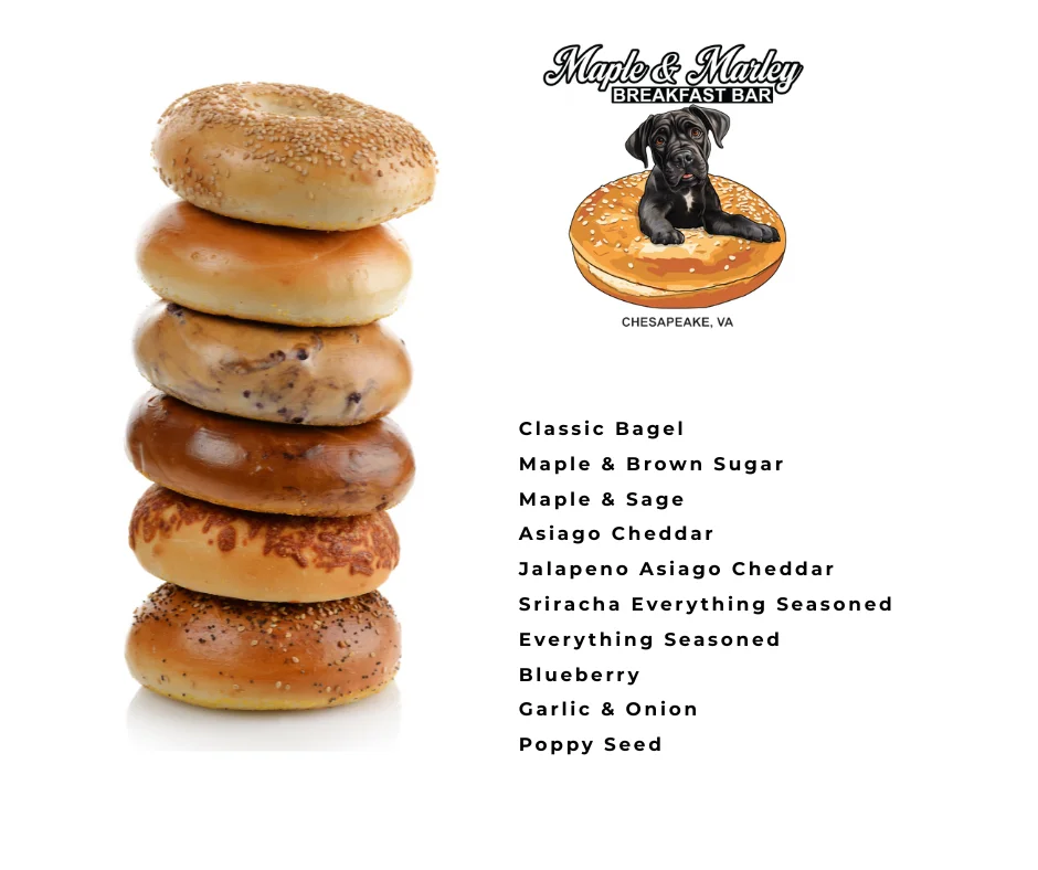Variety of bagels stacked at a breakfast bar