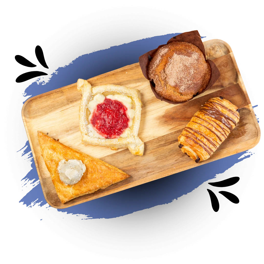 Assorted pastries on a wooden platter