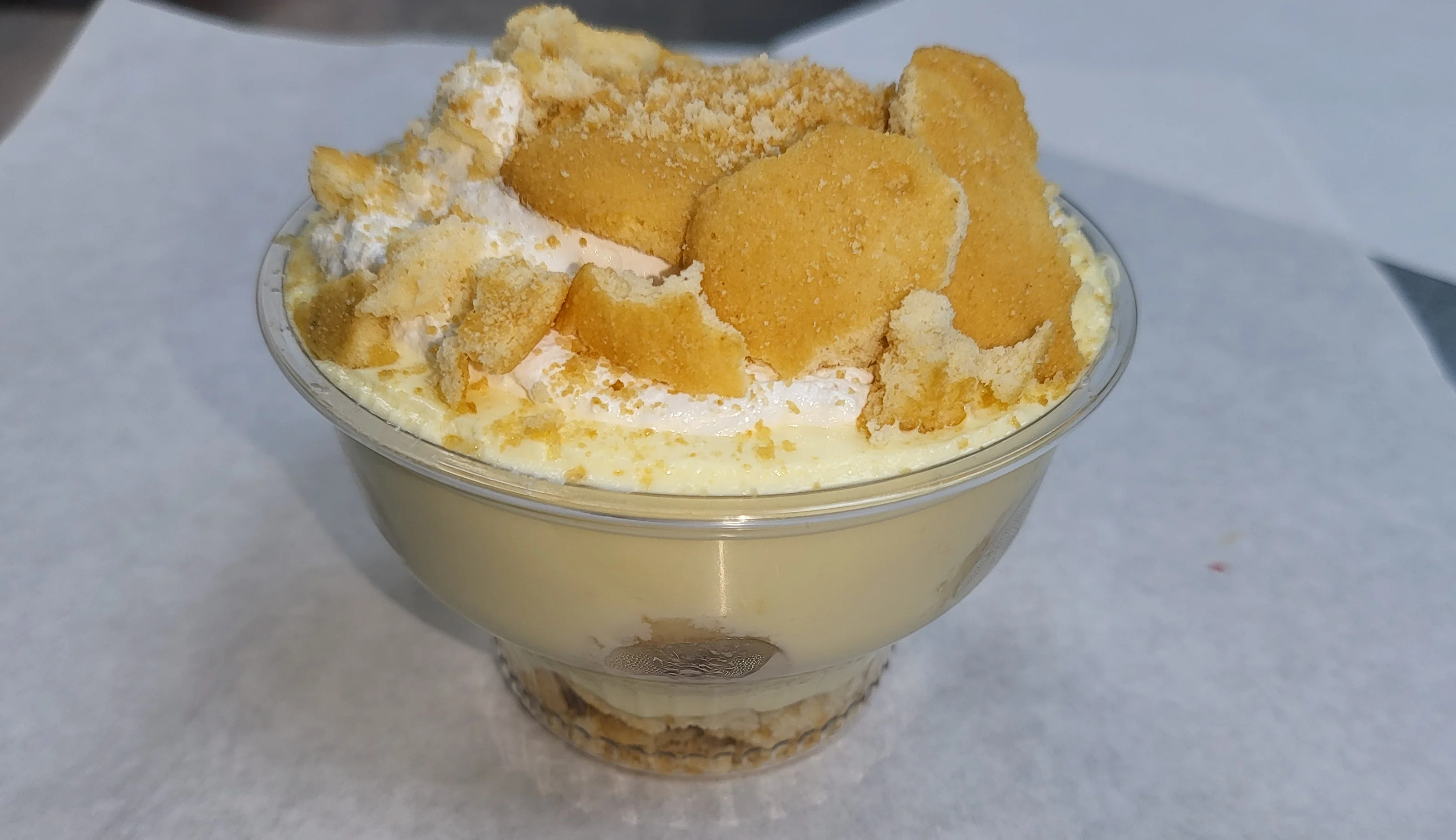 Classic banana pudding dessert in a clear cup