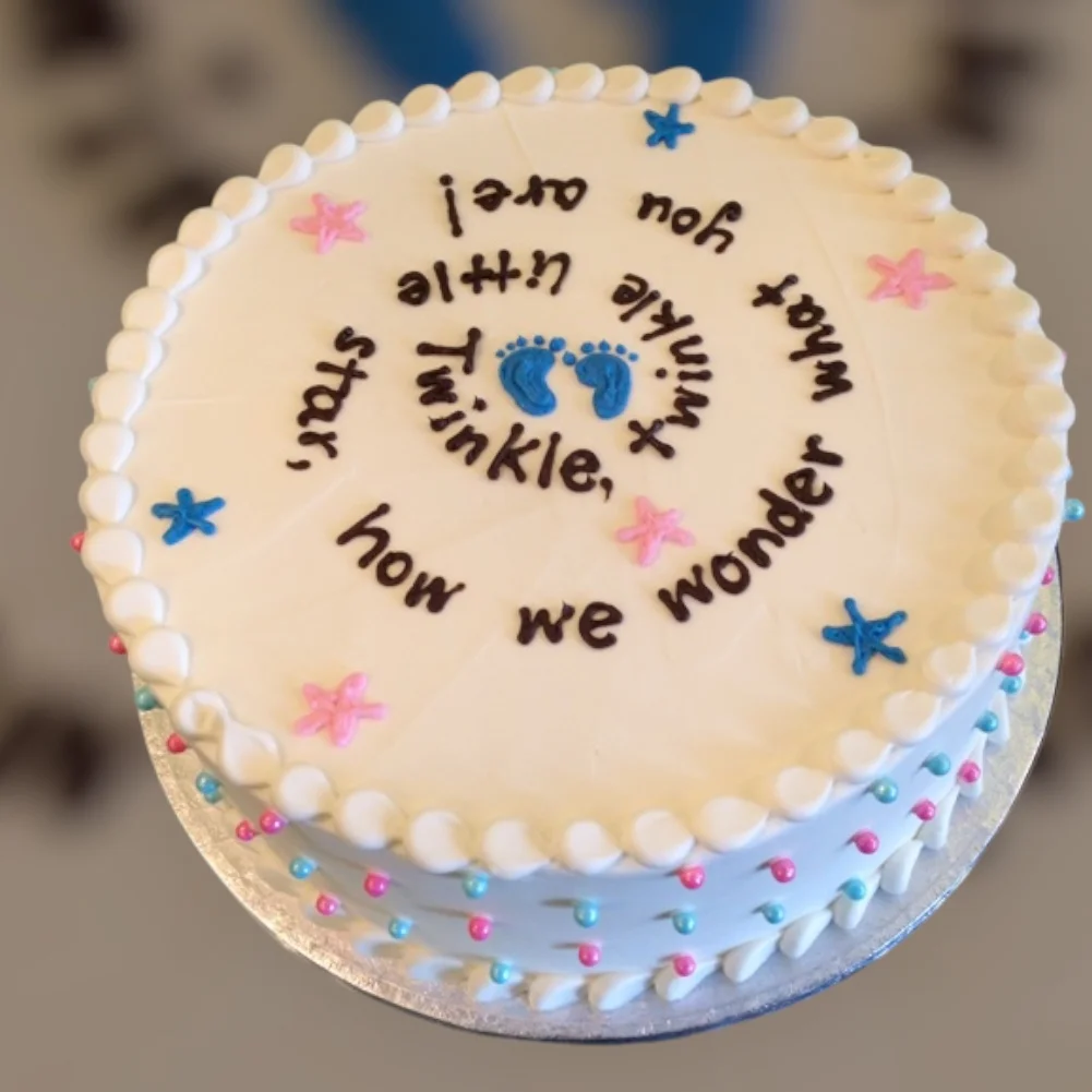 Decorative cake with baby theme and poem