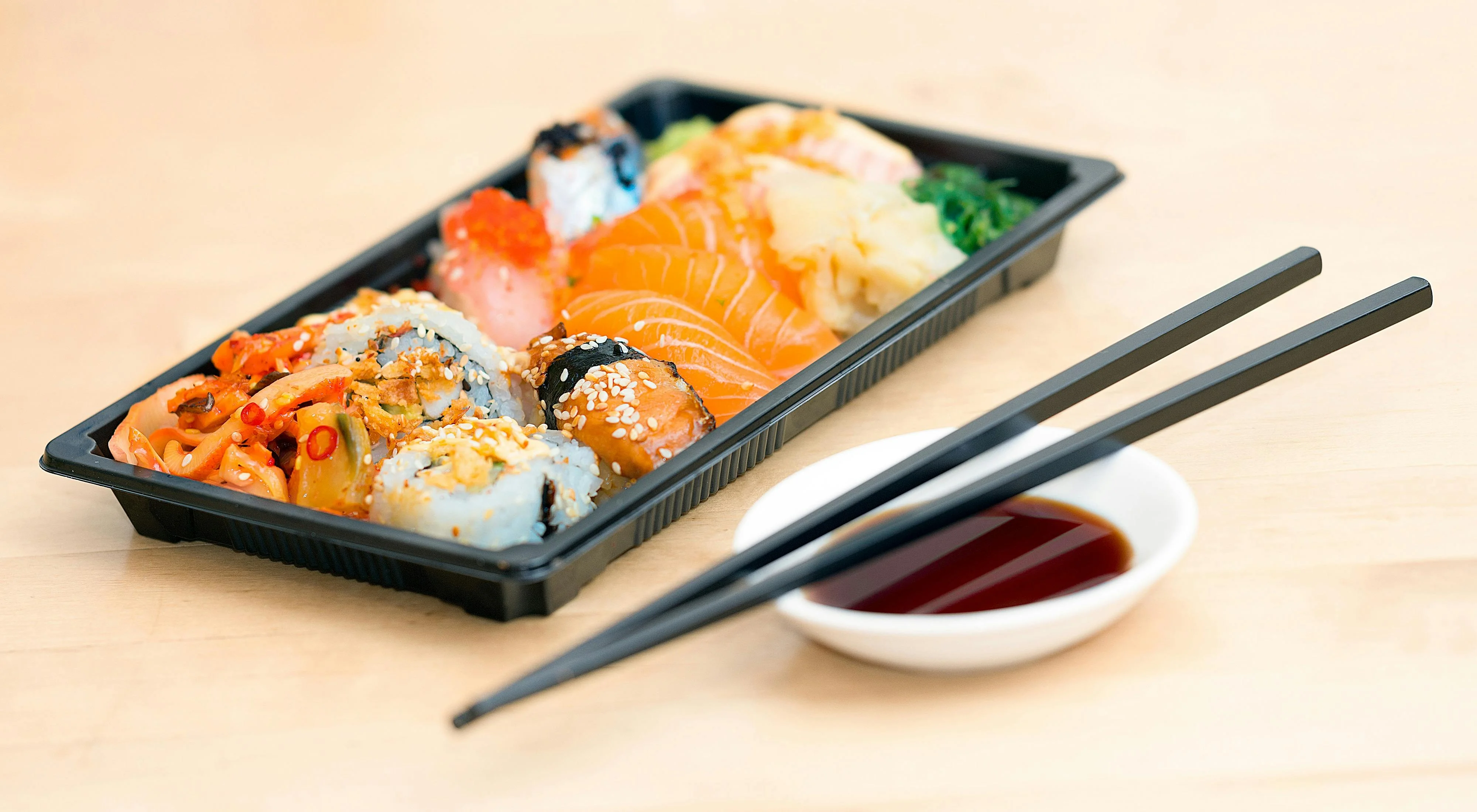 Assorted Japanese sushi platter with sashimi and rolls