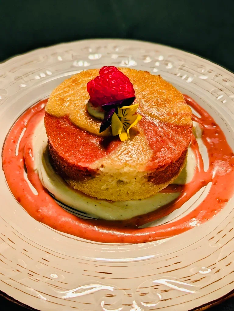 Delicious strawberry shortcake with raspberry sauce