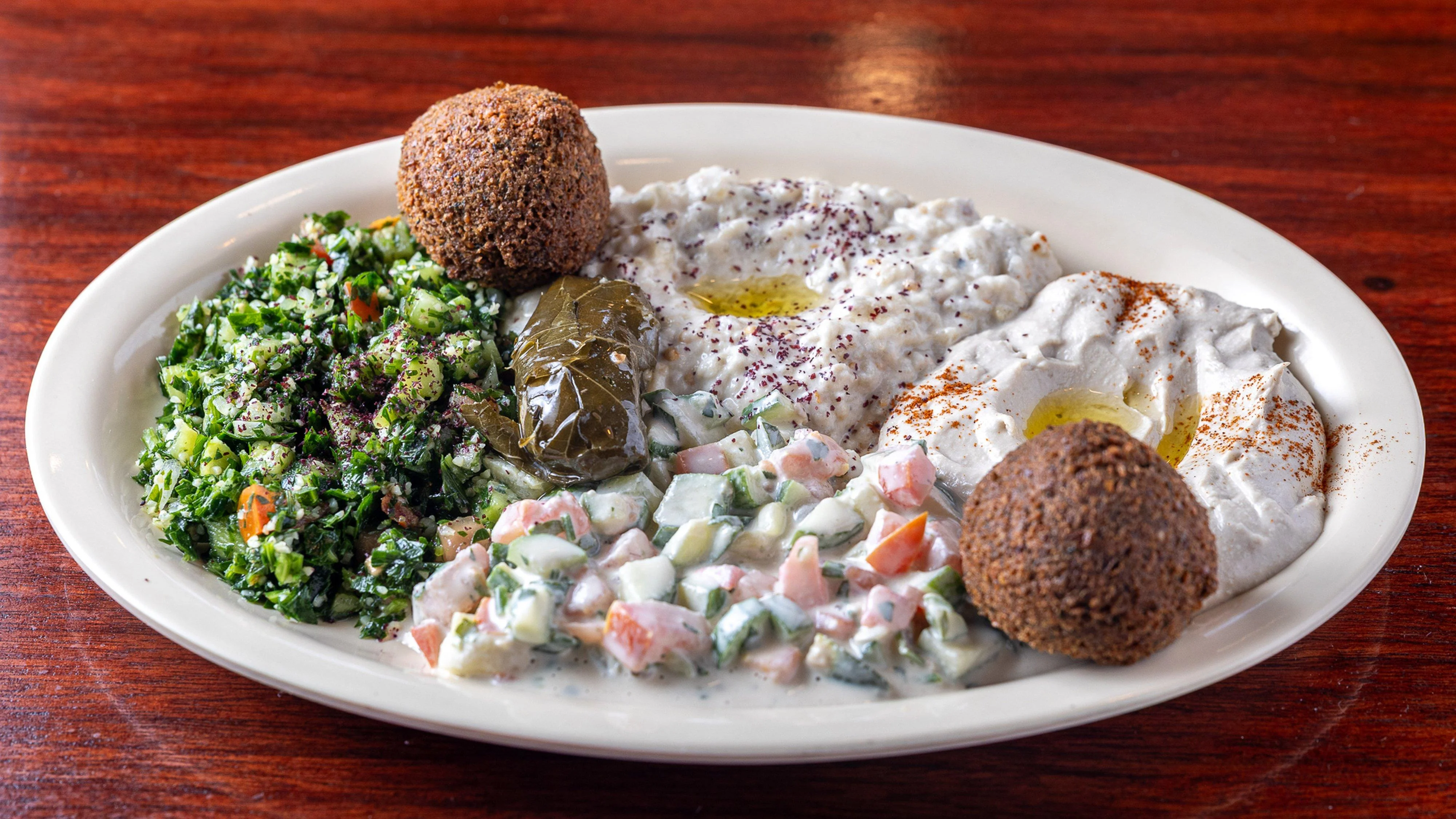 Pita Zone vegetarian lunch with falafel, salads, hummus and baba ghanoush