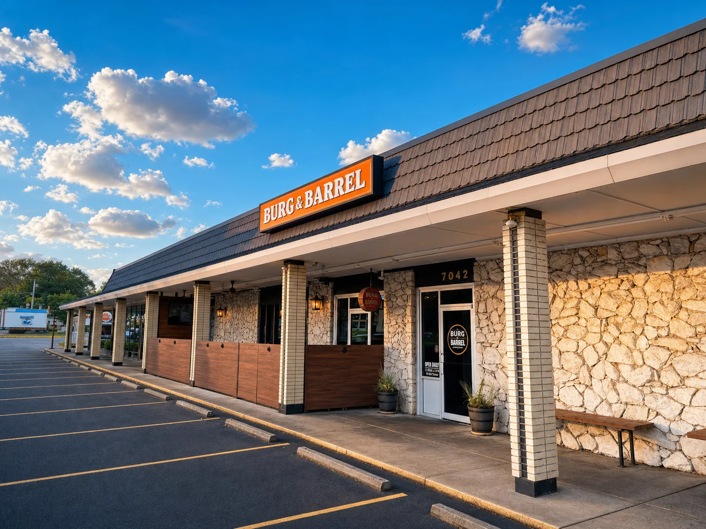 Exterior view of Burg & Barrel restaurant with stone facade