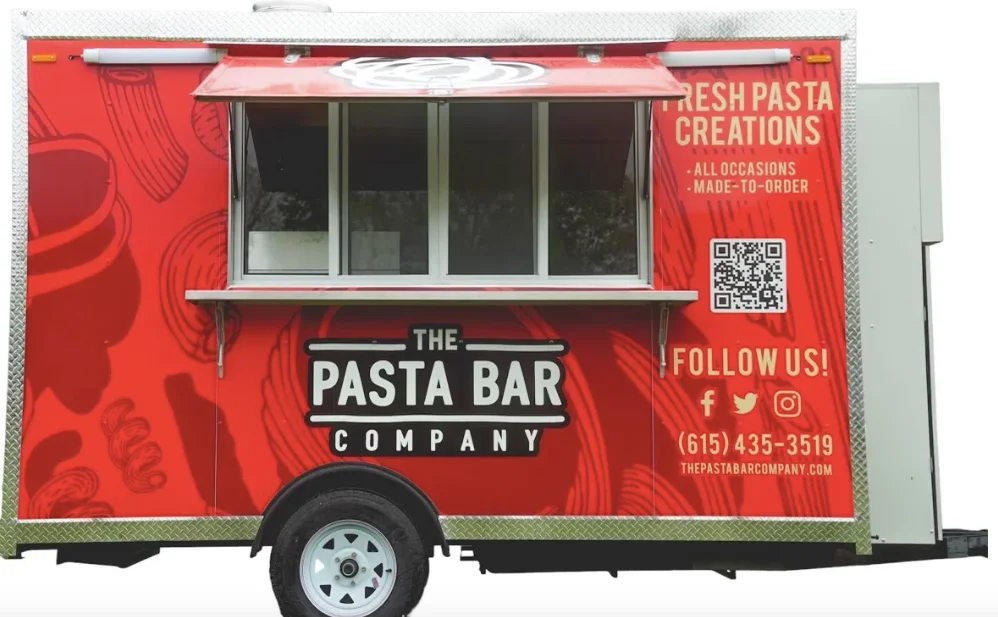 Colorful food truck offering fresh pasta creations